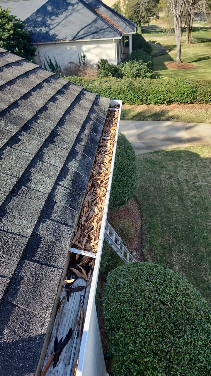 Gutter Cleaning using water by Power Wash Masters LLC