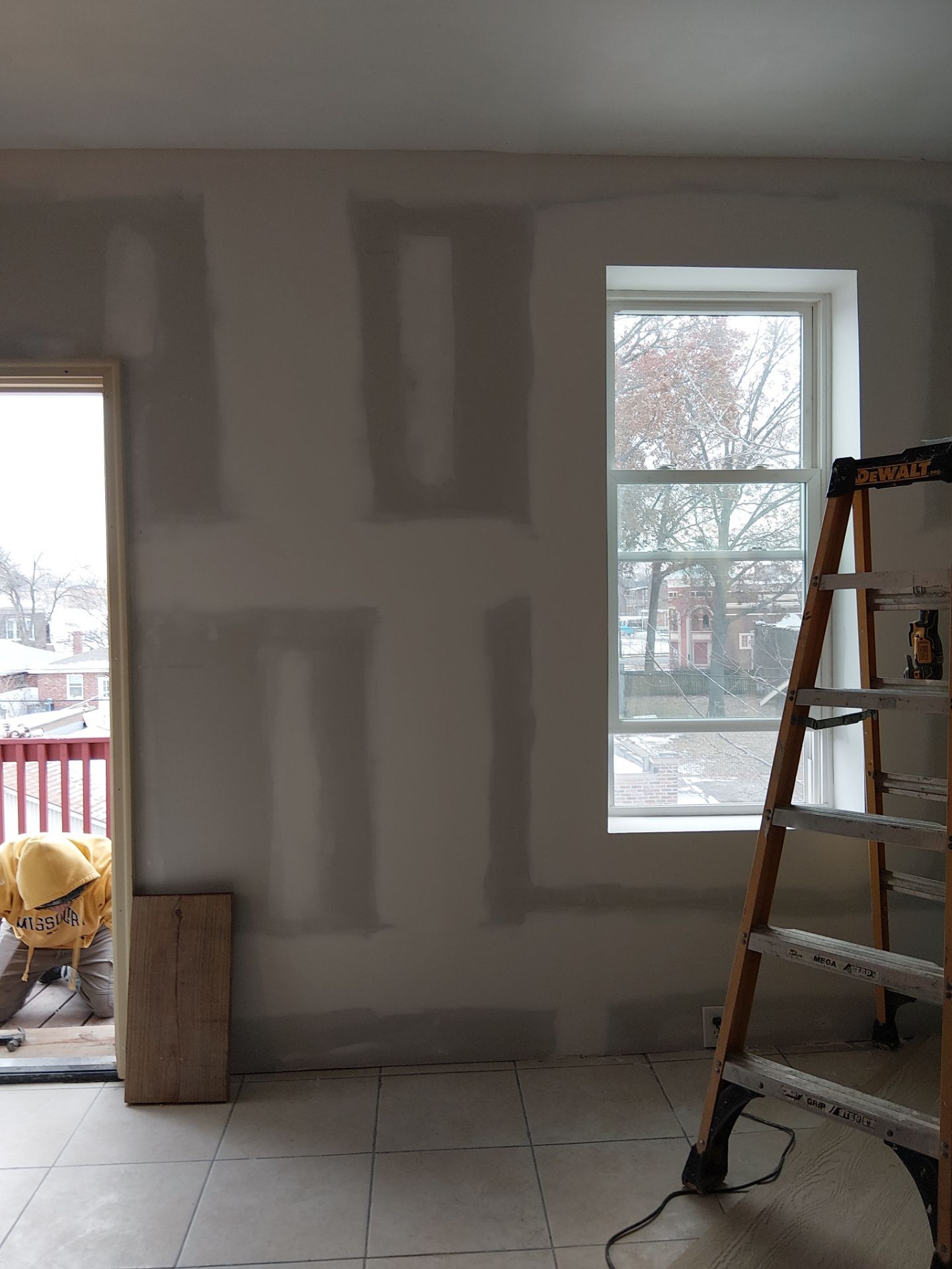 Rear Door Replacement and Kitchen Wall Restoration – St. Louis, MO by Legendary Services Company LLC.