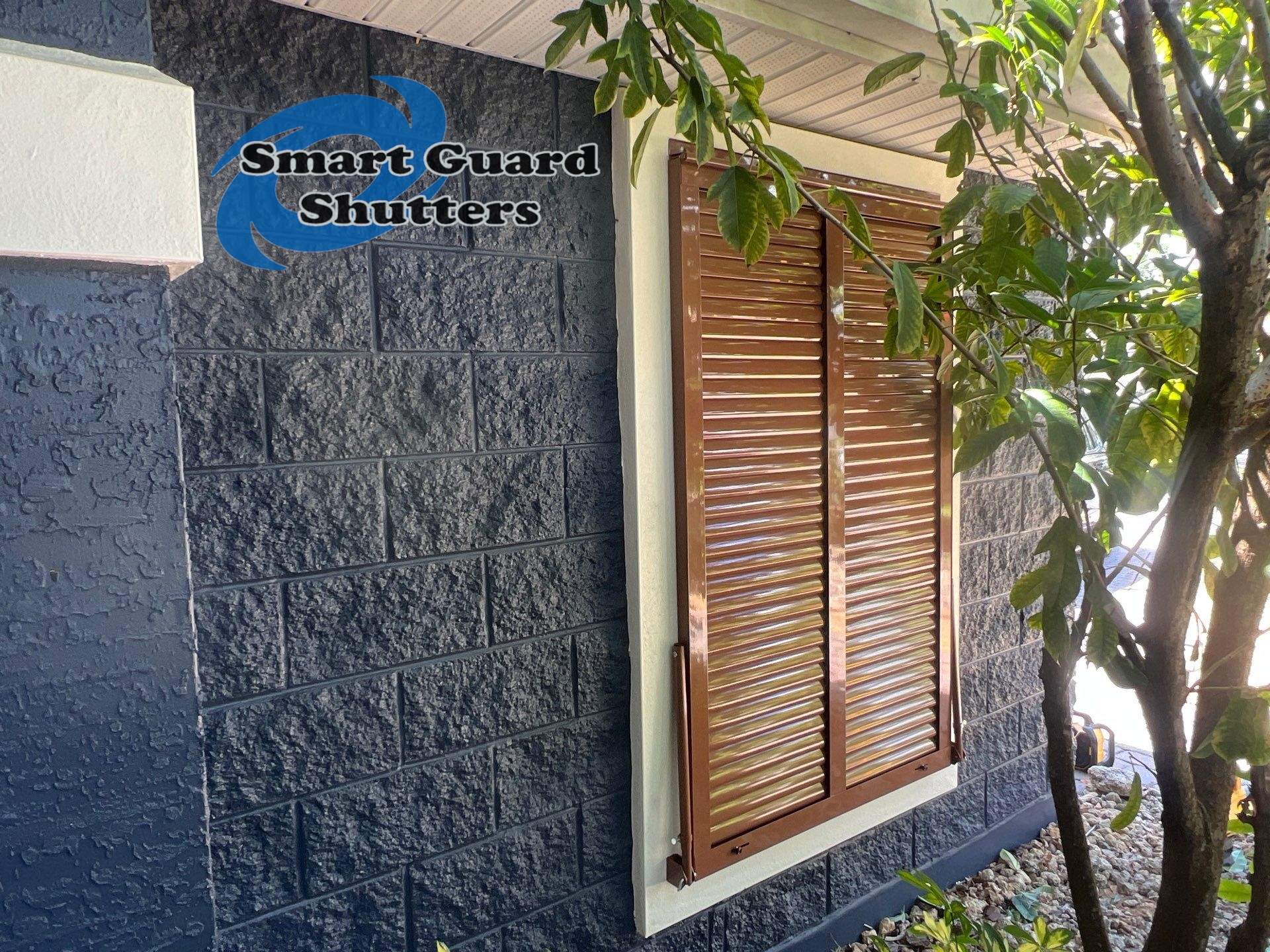 Impact Rated Bahama Shutters in Beige Brown by Smart Guard Shutters