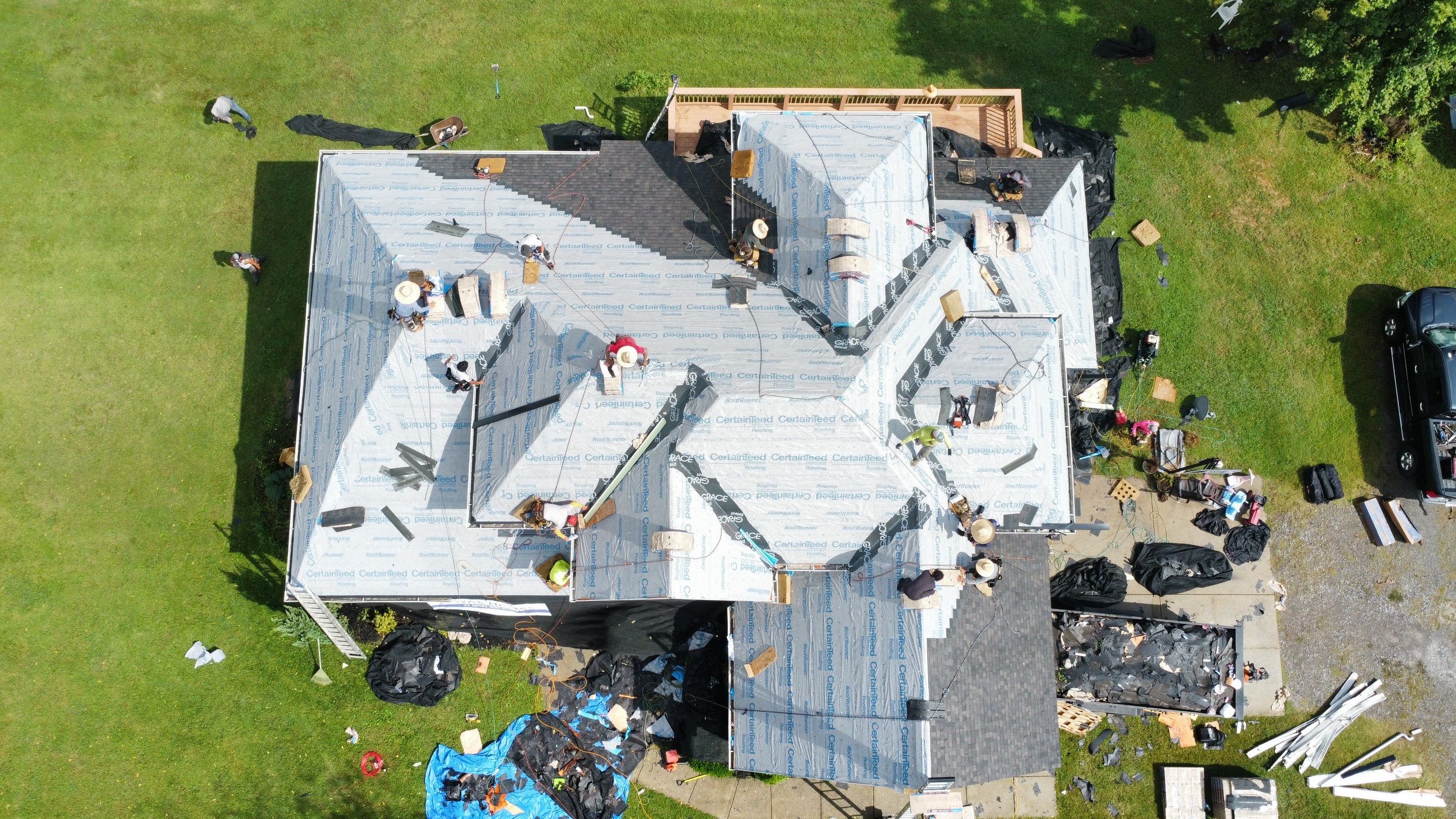 Espresso Re-Roof & Gutters by Royal House LLC
