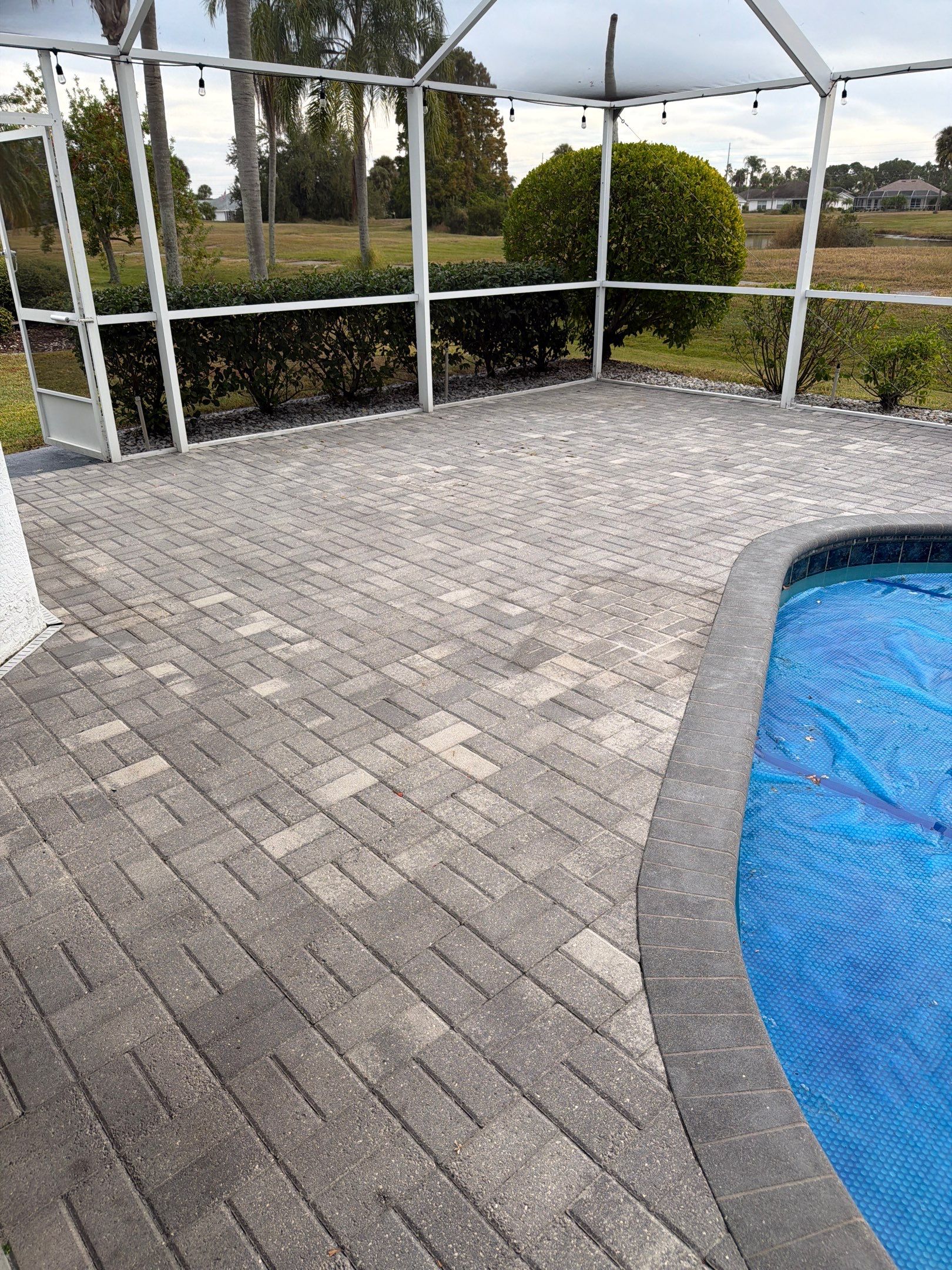 Paver Sealing for Screened Pool Deck in Sun City Center by Supreme Paver Experts