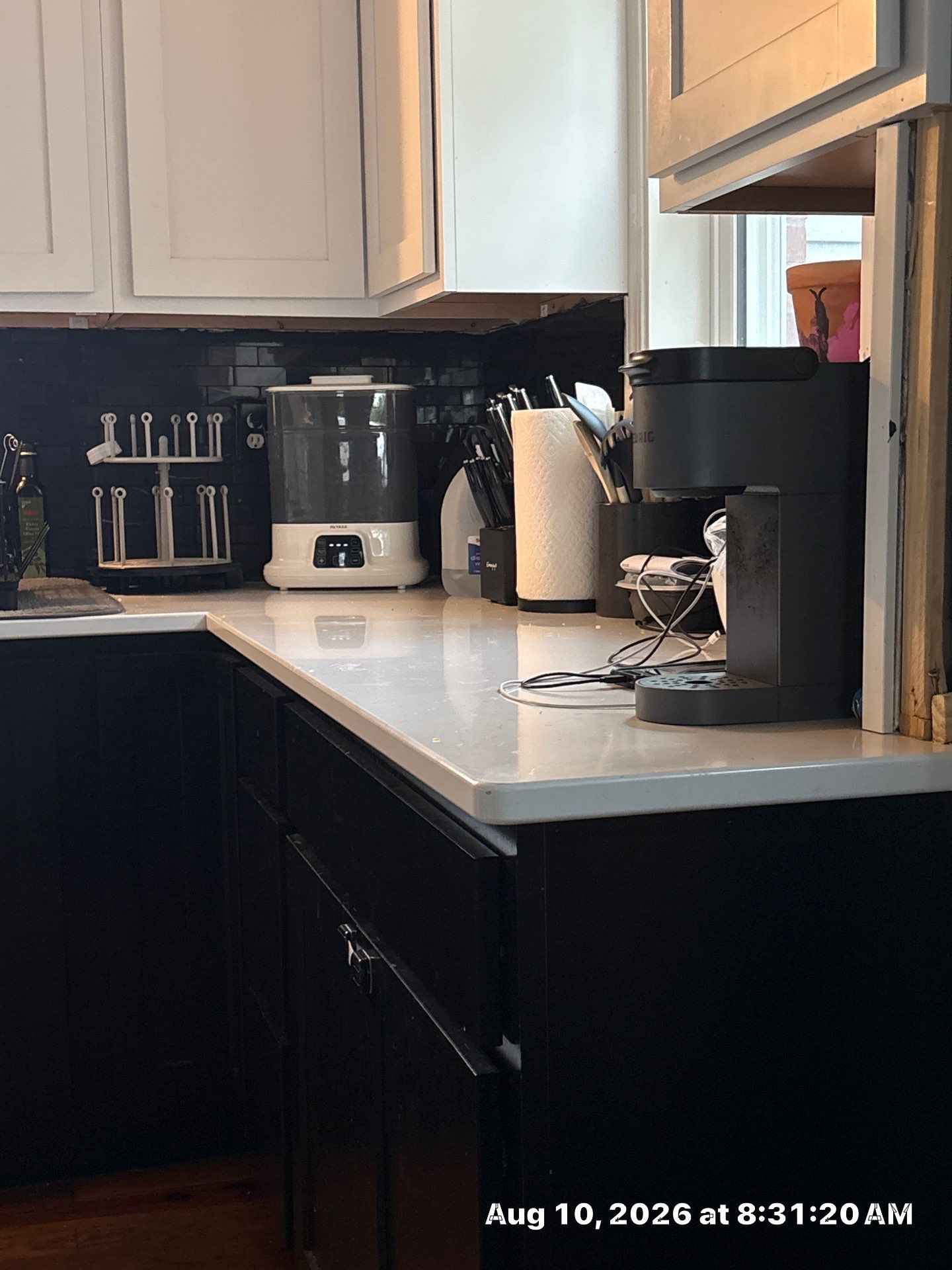 Modern Kitchen Renovation with Black and White Cabinetry in Lincoln by CompanyCam Sales Demo