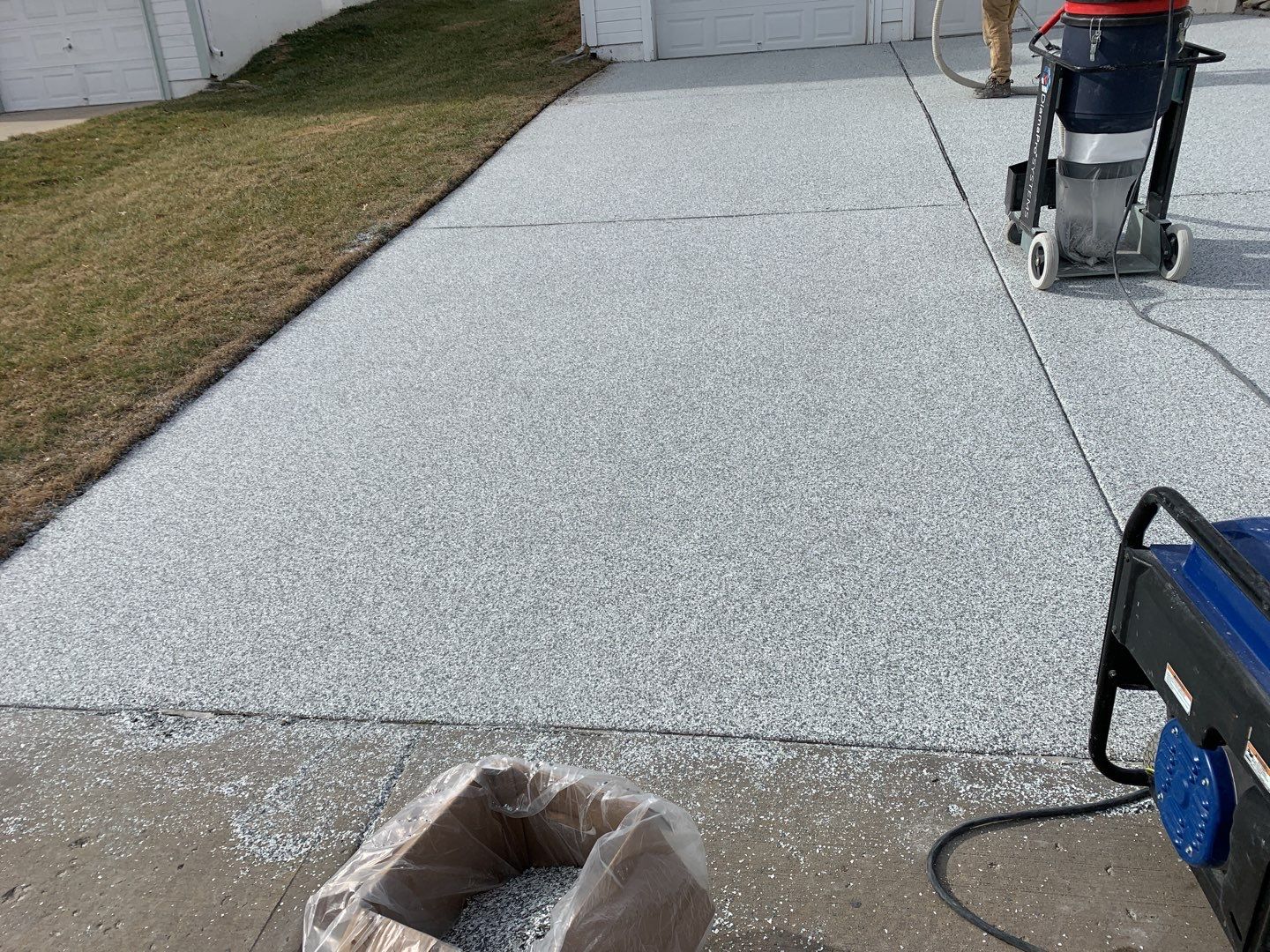 Driveway using Slate Stone by Select Painting, Coatings & Garage Cabinets