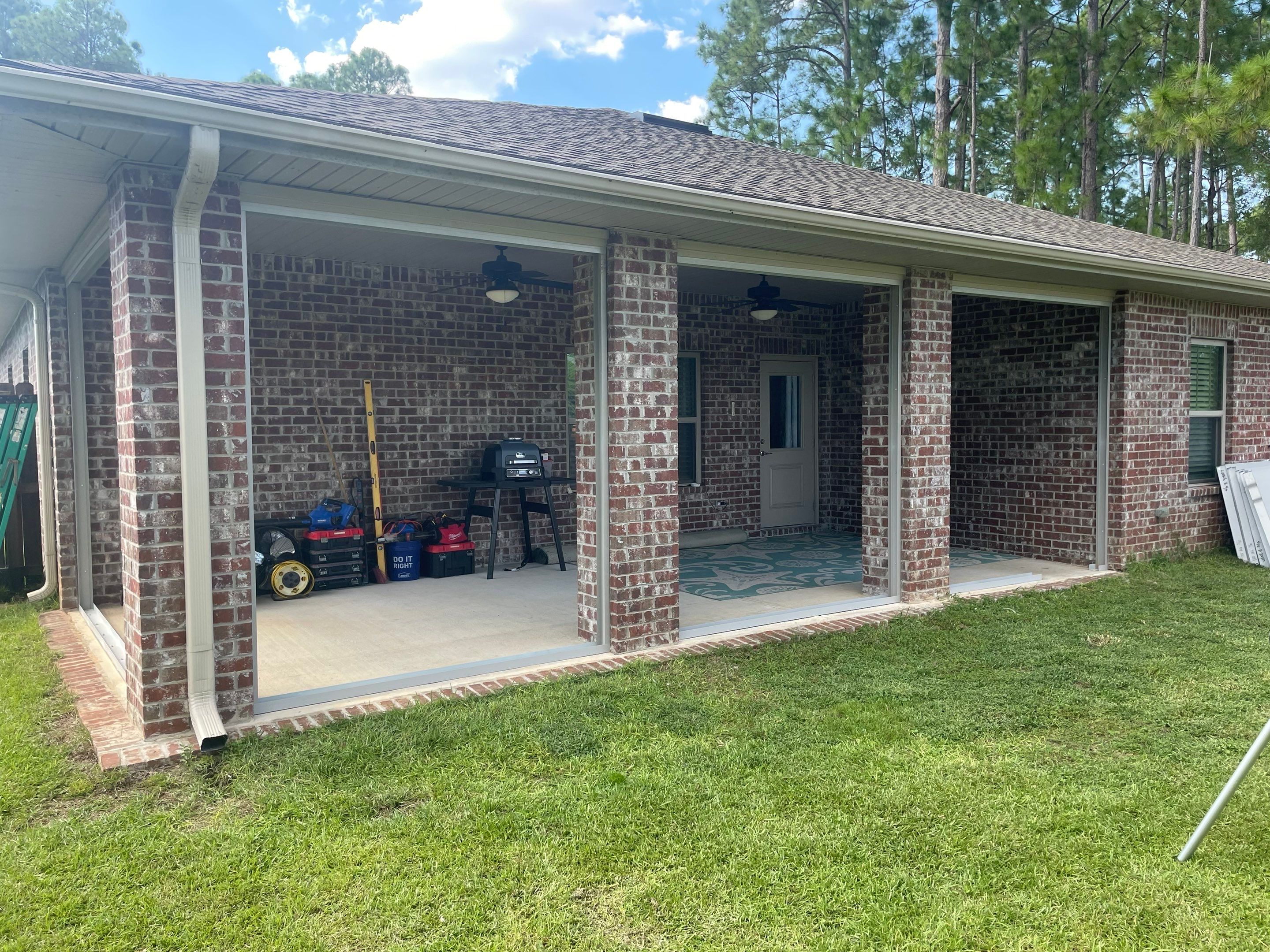 Glass Room Under Existing Patio Cover by Titan Sunrooms