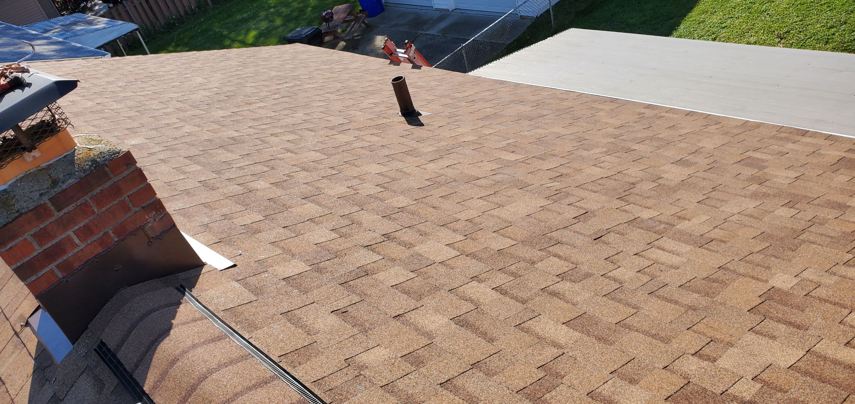 Residential Roofing Installation by Absolute Roofing and Construction