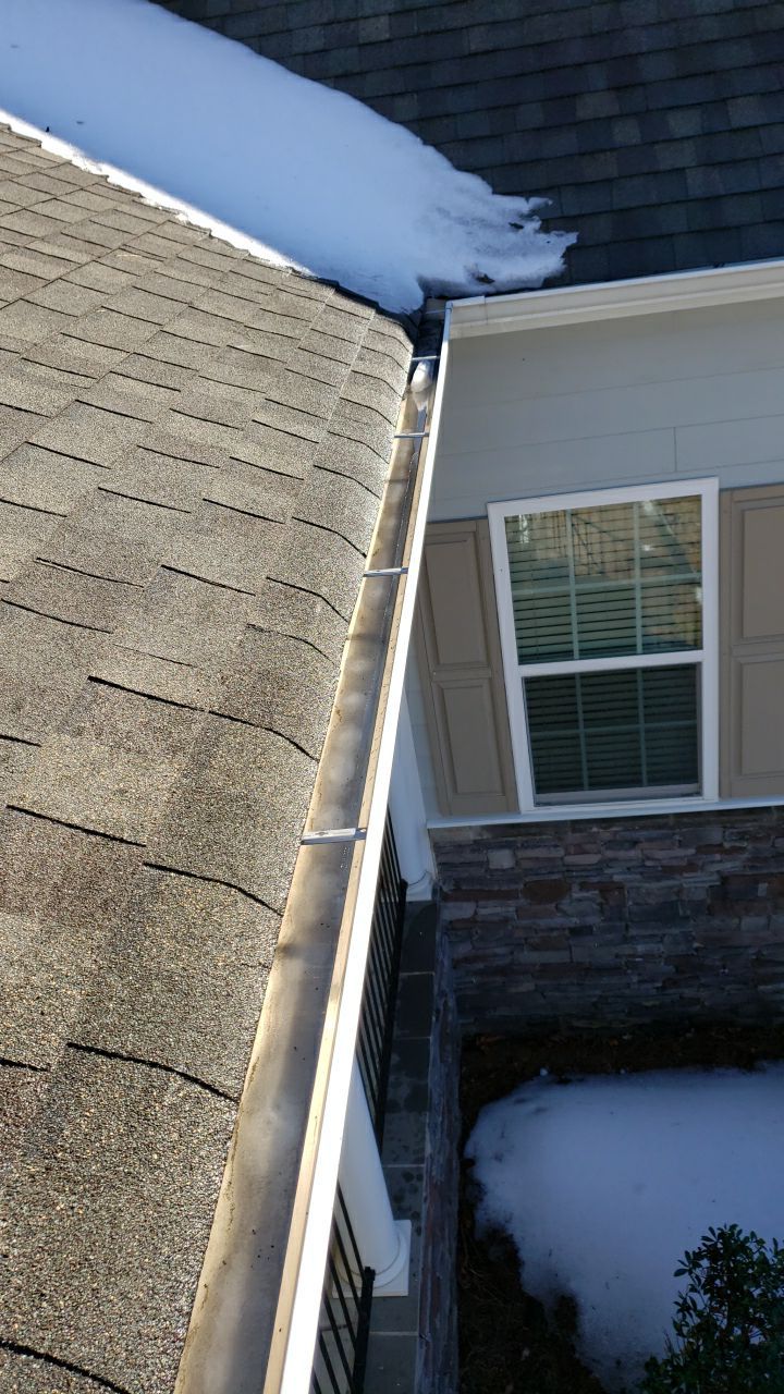Gutter Cleaning using water by Power Wash Masters LLC
