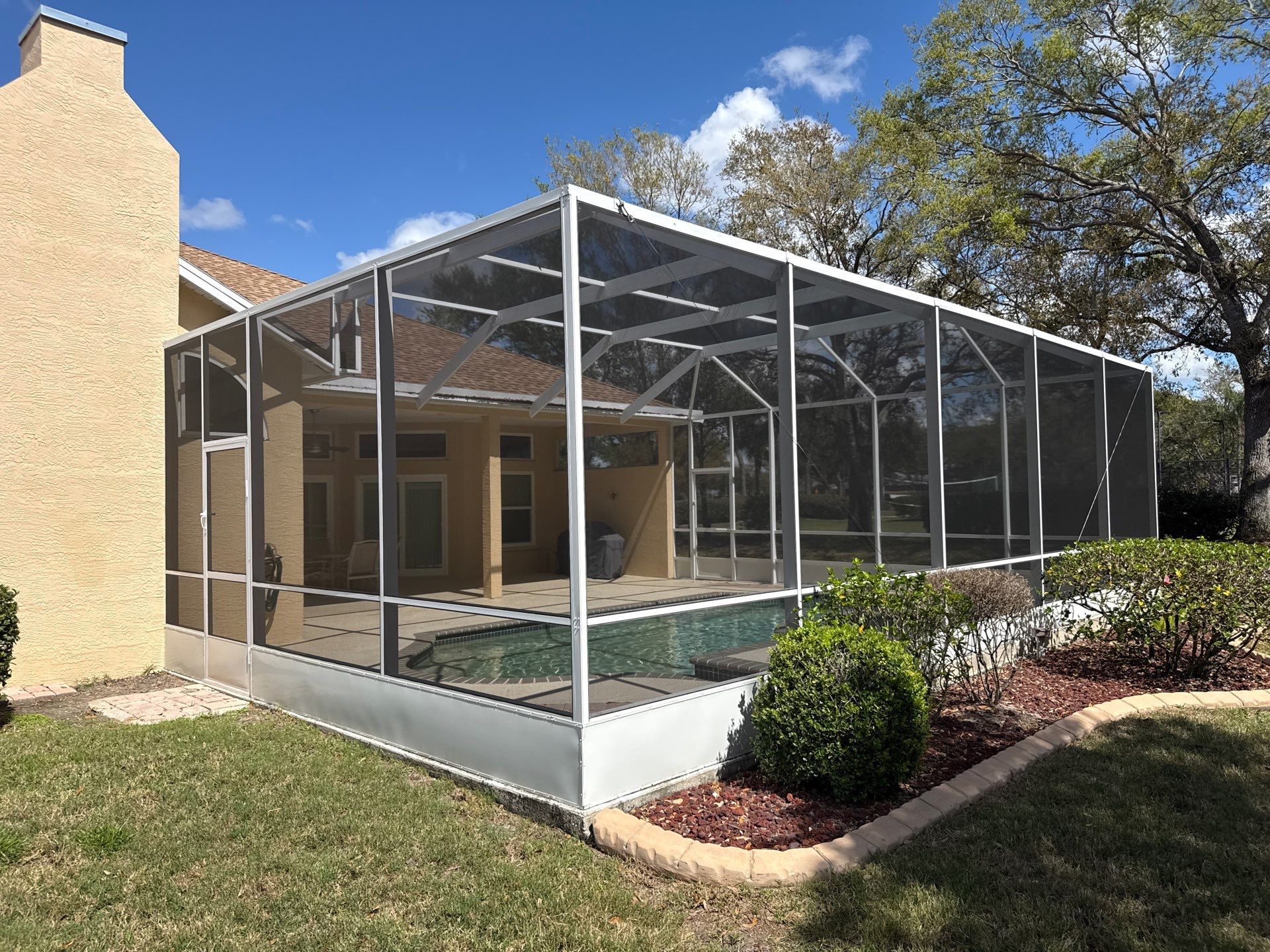 Painted Pool Deck, Pool Cage & Exterior Surface Cleaning in Creekwood – Bradenton, FL by Sunshine AquaWash