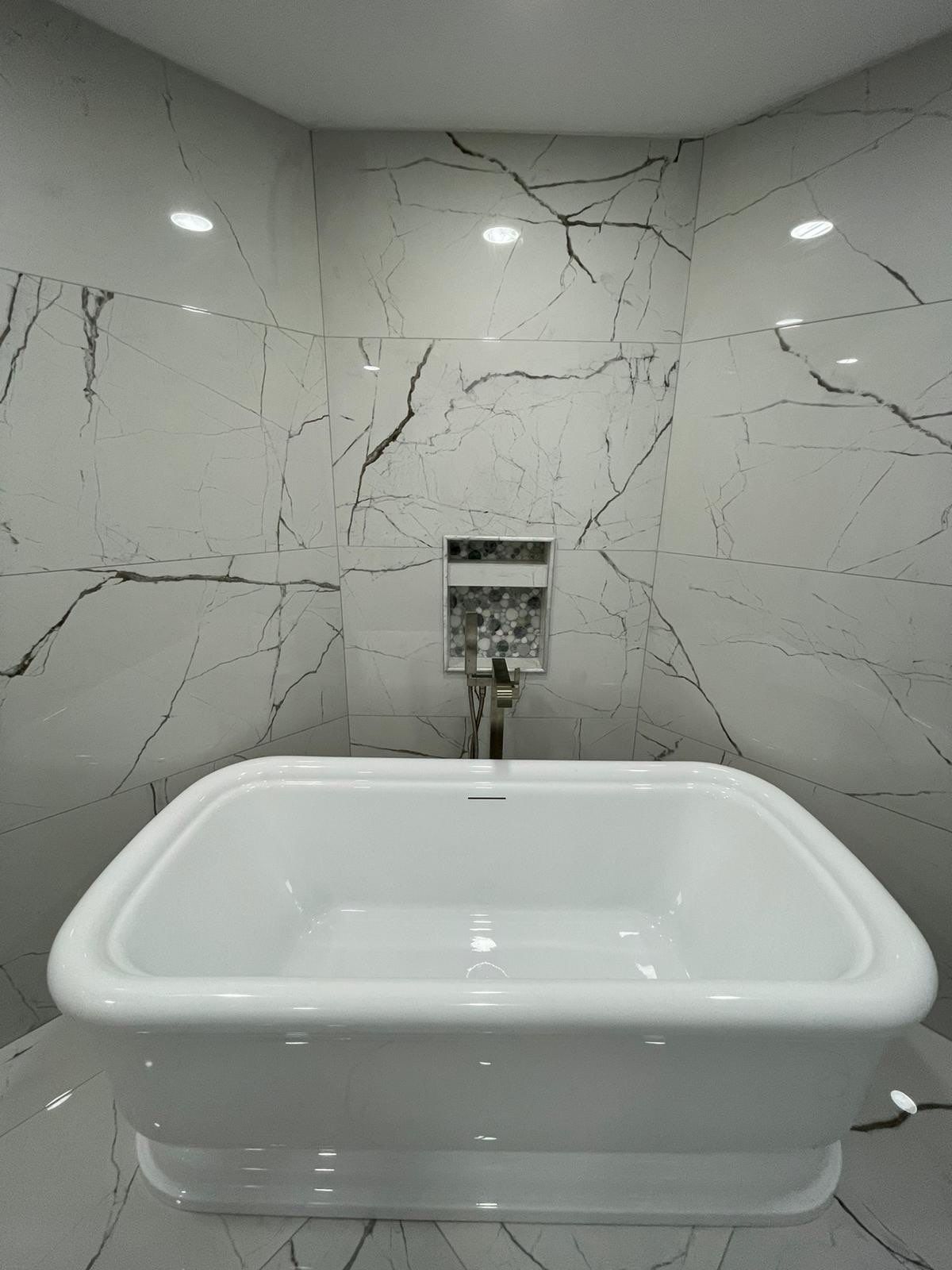 Bathroom Remodel using Tile by Home Concepts Construction