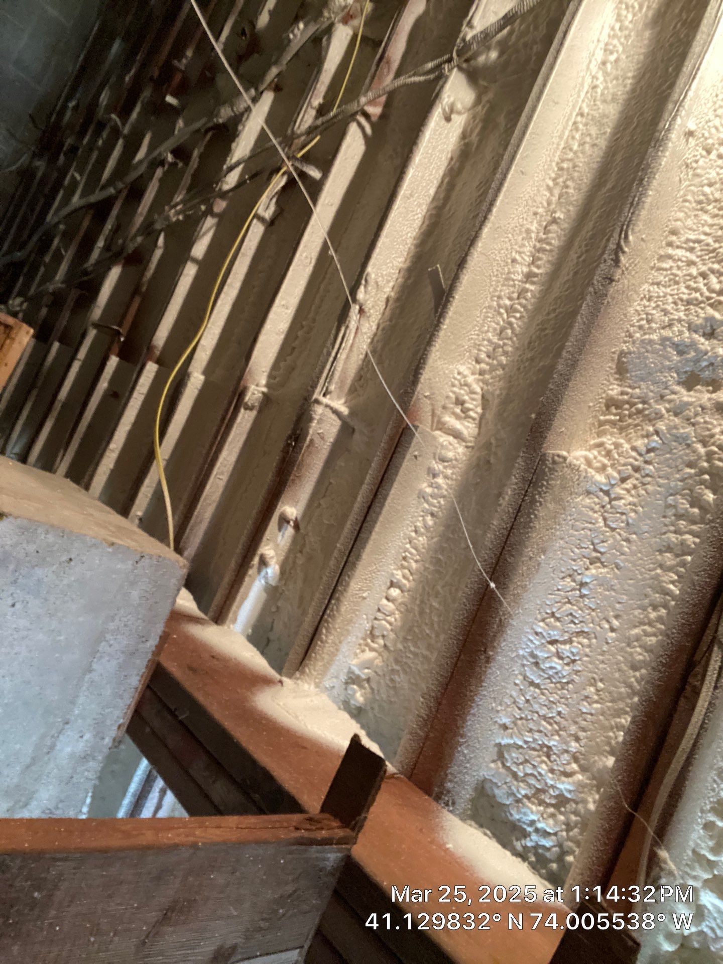 Attic Insulation using open cell spray foam and closed cell rim joist by NYS Foam & Energy