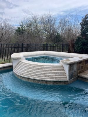 Geometric Pool Remodel with Raised Stone Spa
