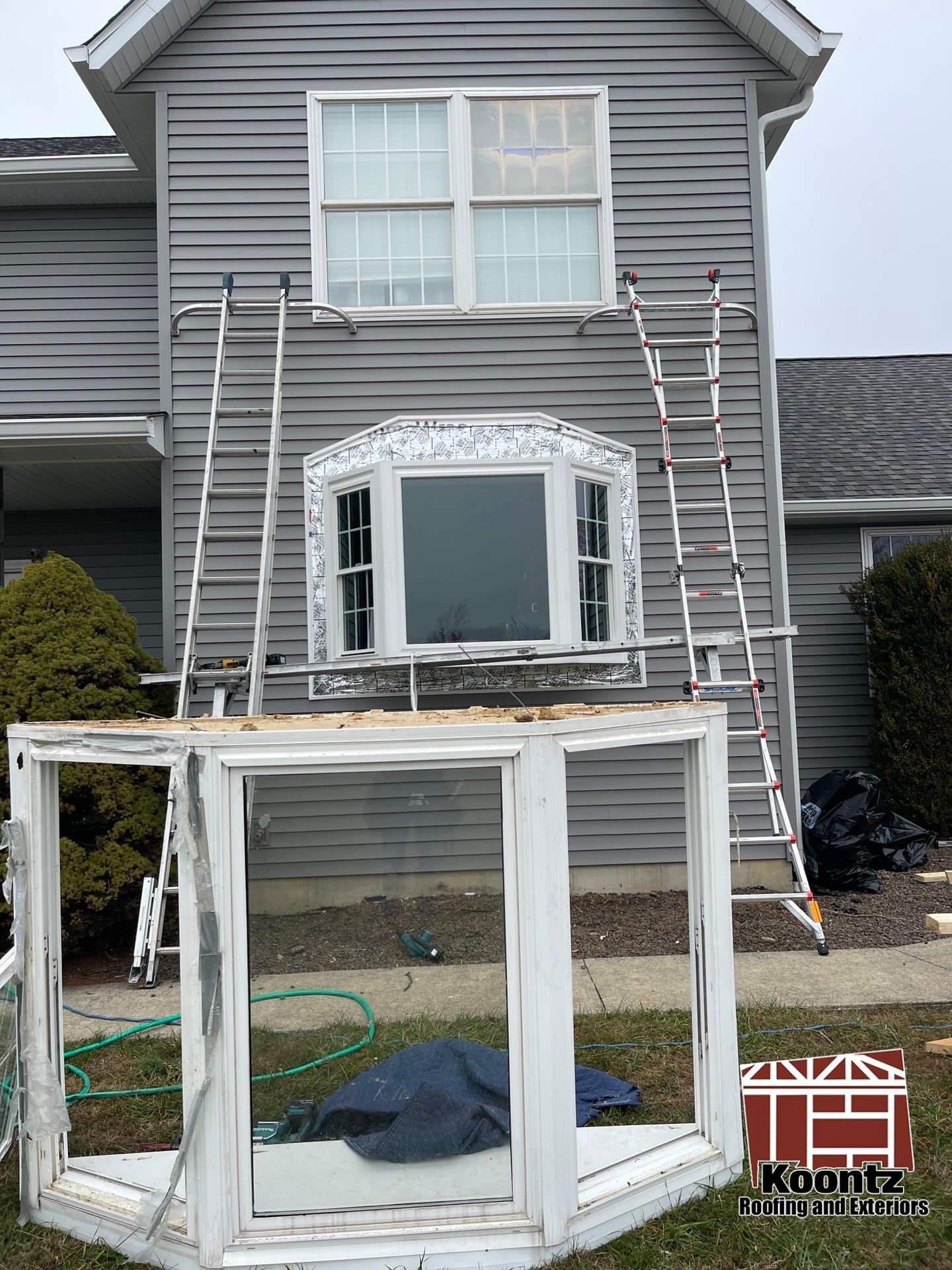 Exterior & Window Installation using CertainTeed Mainstreet & ViWinTech Windows by Koontz Construction