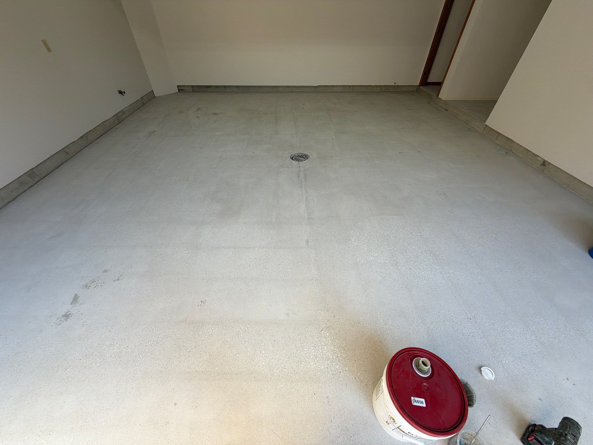 Custom Epoxy Flake Floor Coating and Ceiling Repair in Muskegon by Gordon Painting