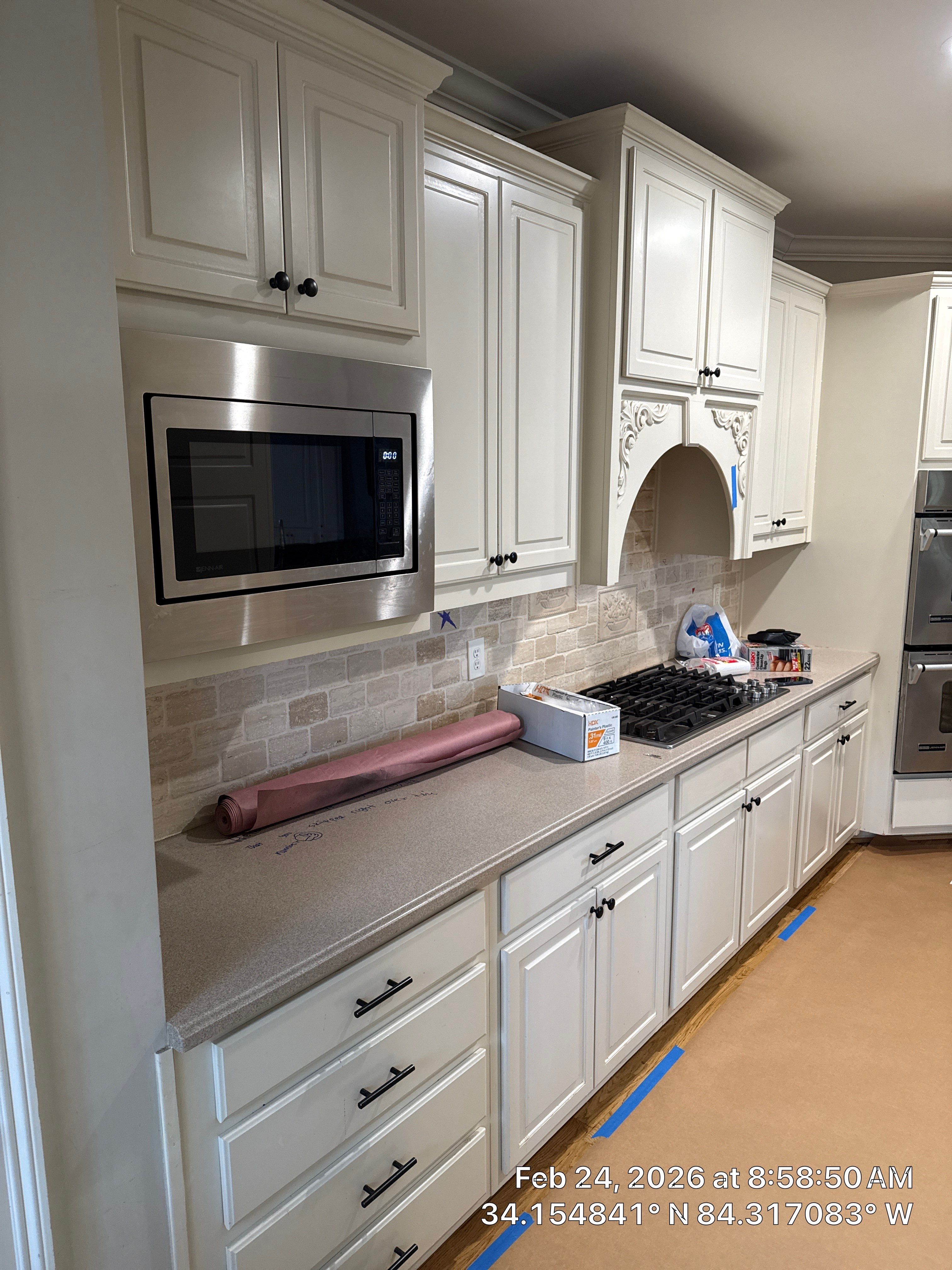 Alpharetta Kitchen Remodel Featuring Double Islands and White Quartz by Heart & Home Kitchen & Bath Remodeling LLC