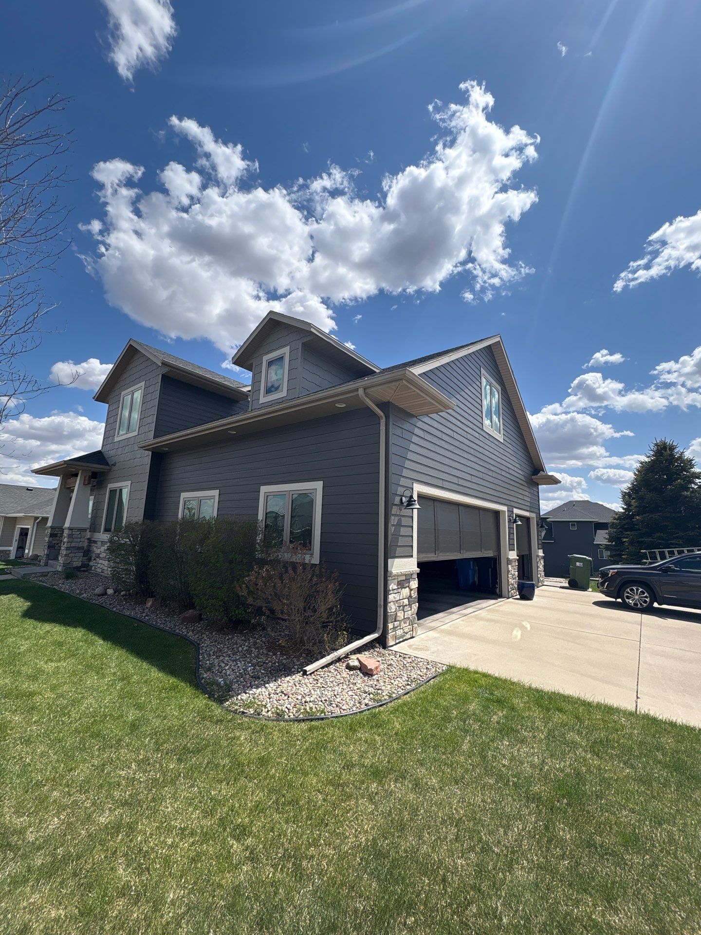 Residential Exterior Painting and Color Update in Sioux Falls by Select Painting, Coatings & Garage Cabinets