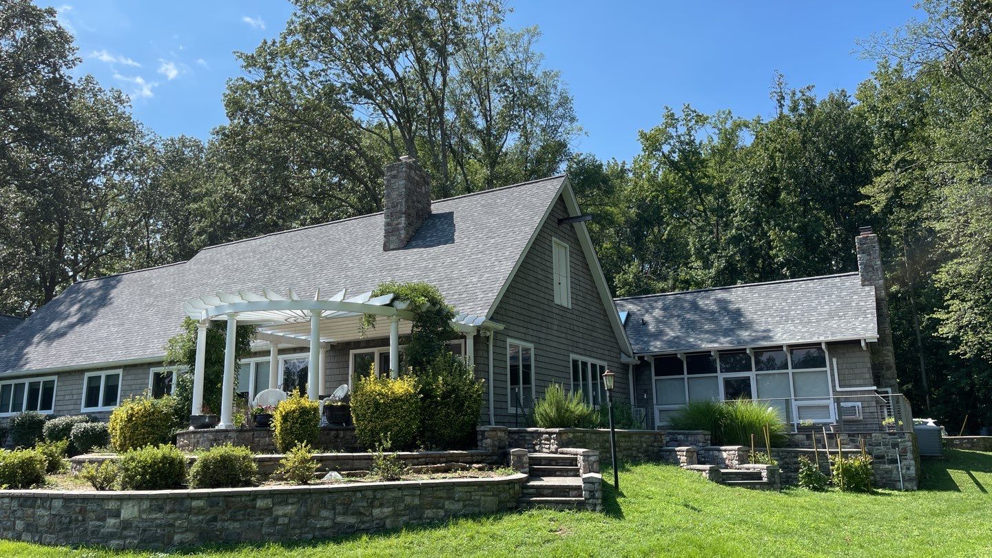 Roof Replacement using IKO Dynasty by American Home Contractors