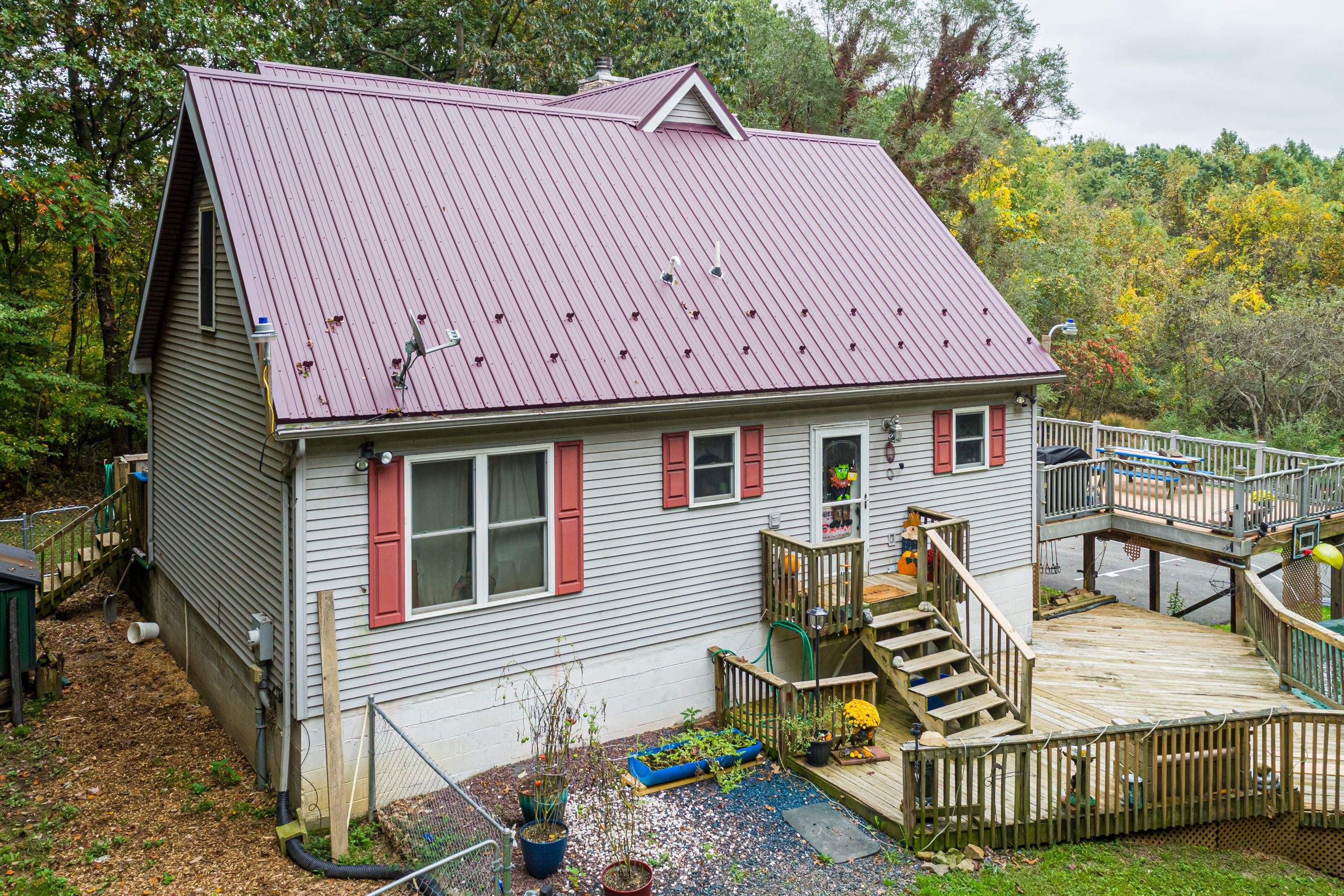 Metal Roof-burgundy by Esh Builders