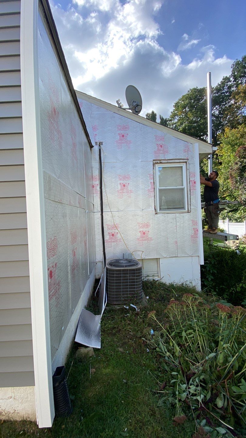 Siding Installation using CertainTeed monogram 4" double 4 Charcoal Gray by A Plus Exterior