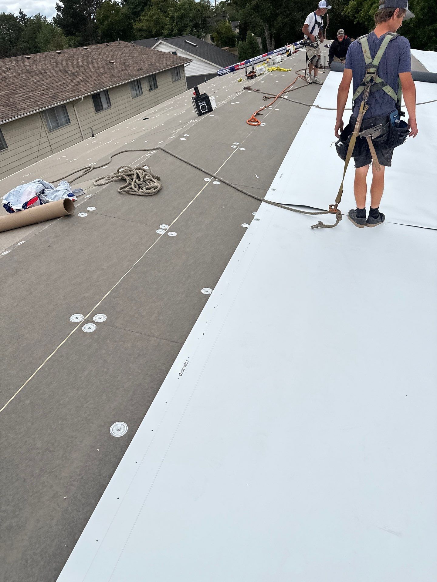 Commercial Flat Roof Installation using GAF 60Mil TPO  by Orezona Building & Roofing Company, Inc.