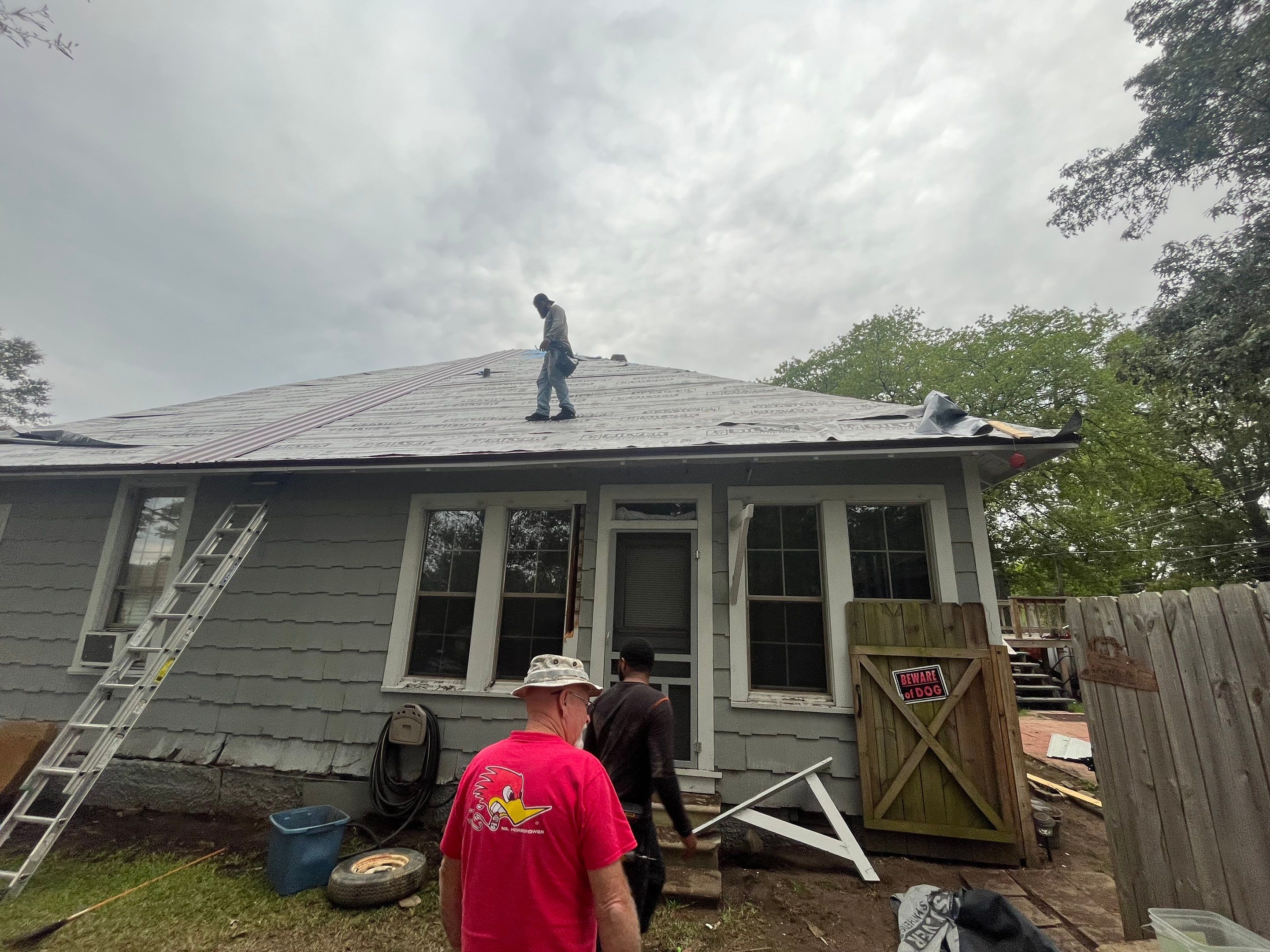 Residential Metal Roof Replacement using Reed's Metals: Colored Residental Panel (Burgundy) by Hostetler Roofing