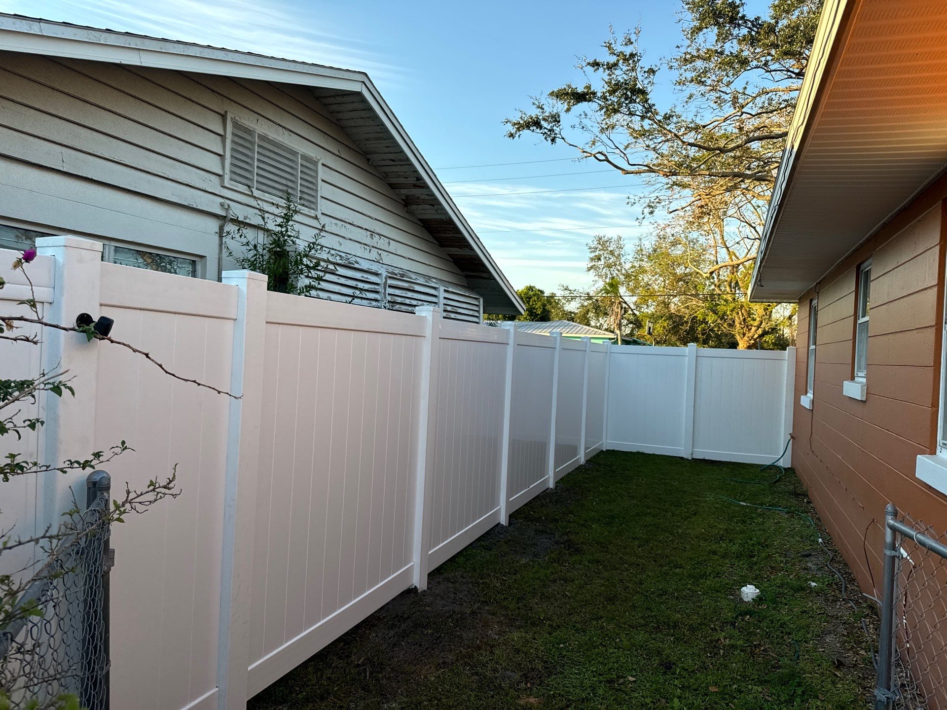 Vinyl Fence Installation using 6Ft White Vinyl Privacy Fence and a 4Ft White Vinyl Picket Fence by Asap fence and gates, LLC