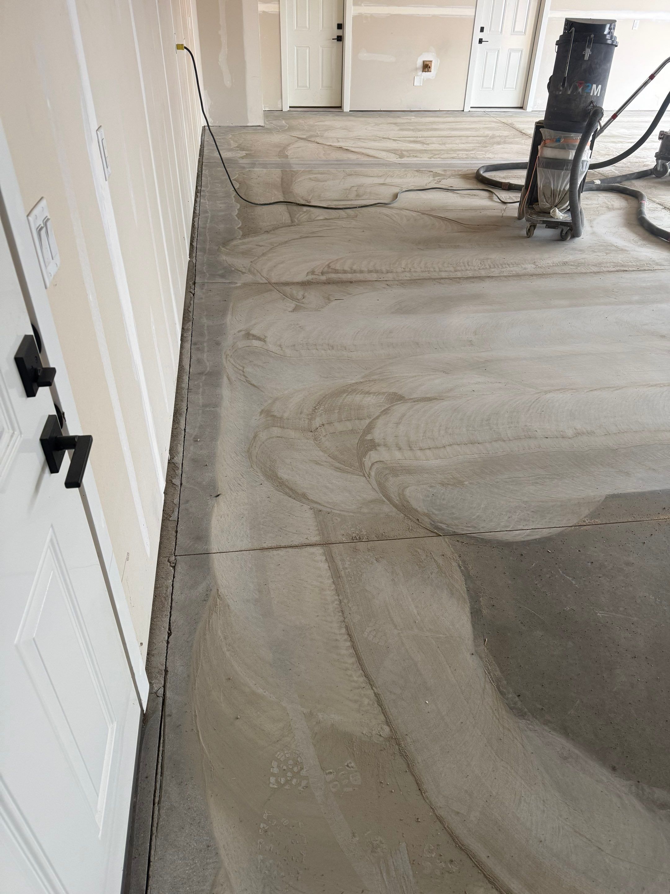 Grey Speckled Epoxy Floor Coating for Sioux Falls Garage by Select Painting, Coatings & Garage Cabinets