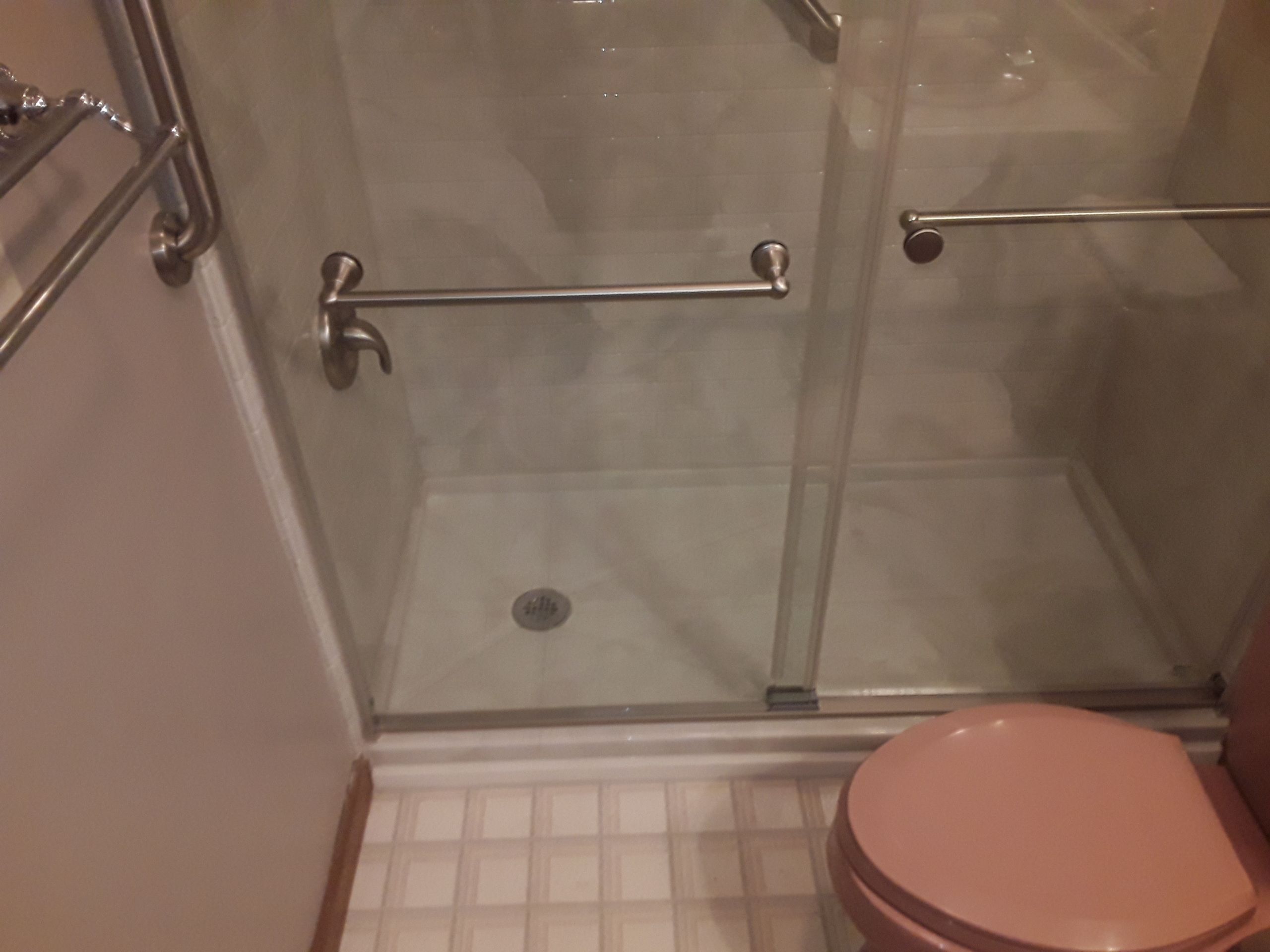 Tub to Shower Conversion using BCI Acrylic Shower System by Secure Construction Company Inc
