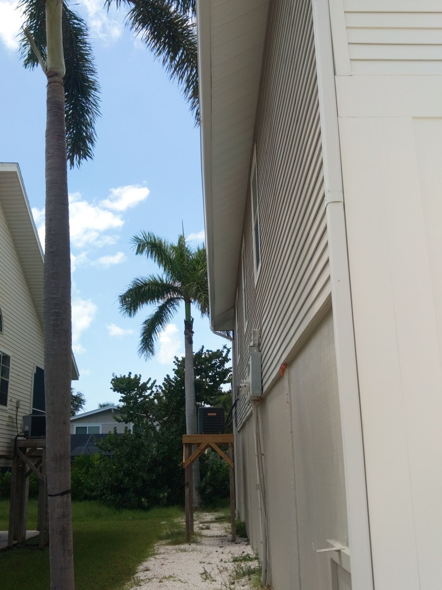 Complete Gutter System with Downspouts & Guards in Fort Myers Beach FL by Gutter Professors