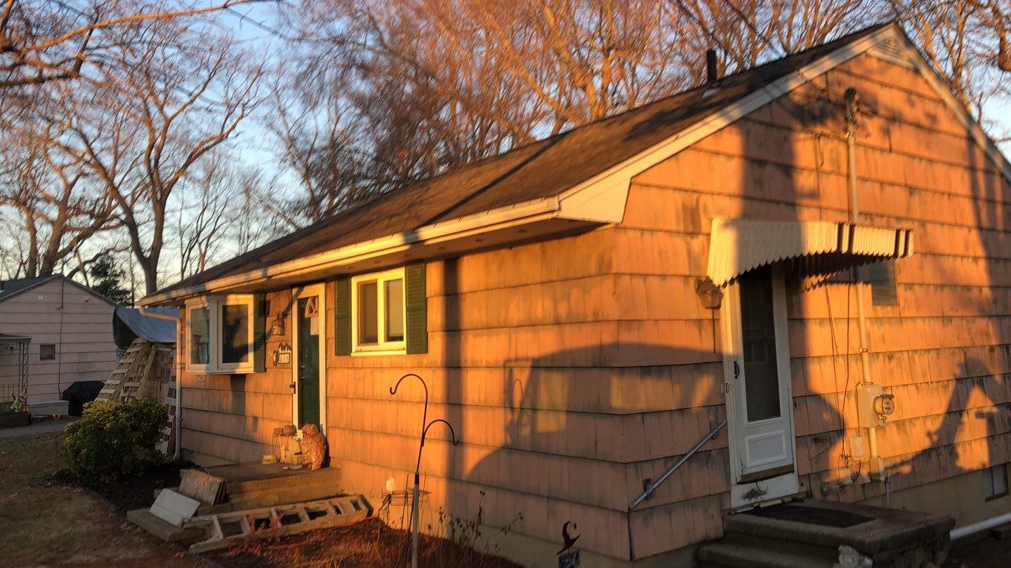 Siding Installation using Certainteed Mainstreet Forest Green by A Plus Exterior
