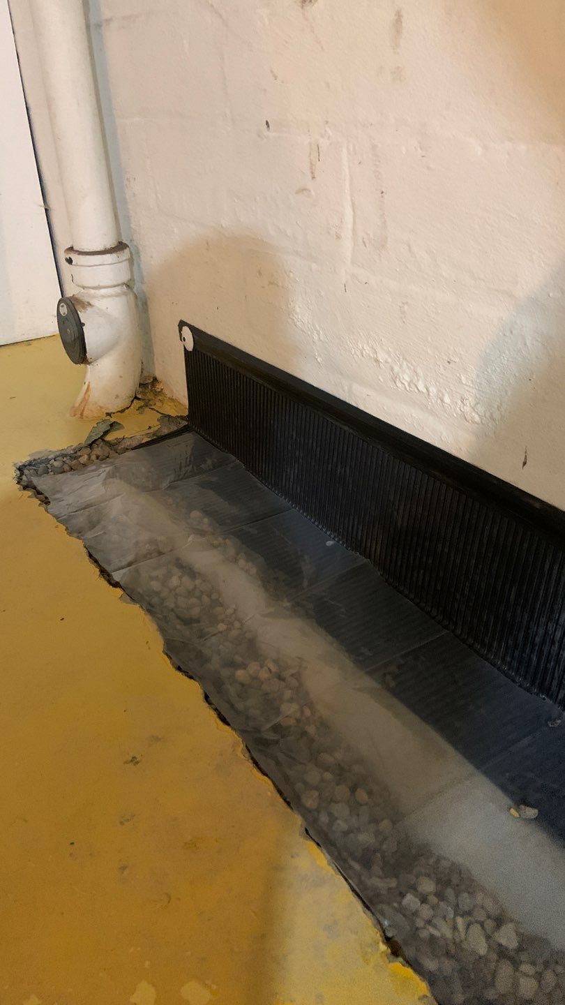 From a Conversation to a Dry Basement for Scott & Jean by Waterproofing Northeast