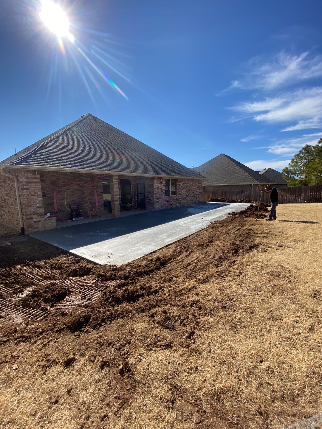 Concrete Slab , Retaining Wall , Fence, and landscape. by Clays Services Inc