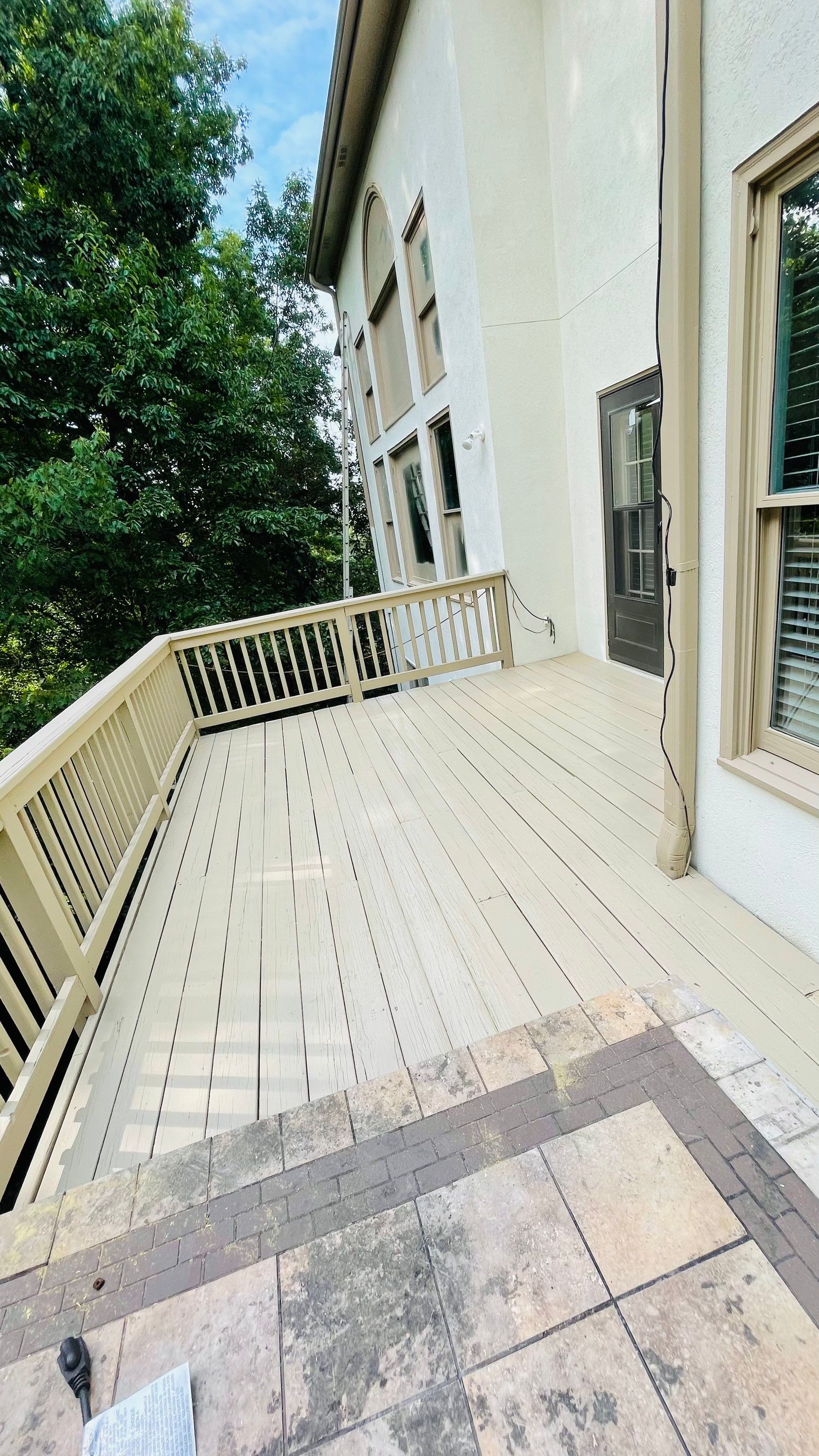Stucco Exterior Painting and Deck Refinishing in Duluth by Swift Home Renovations