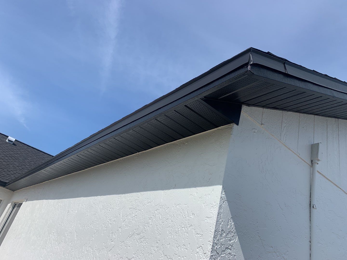 Black Seamless Gutters for Modern Cape Coral Homes by Gutter Professors