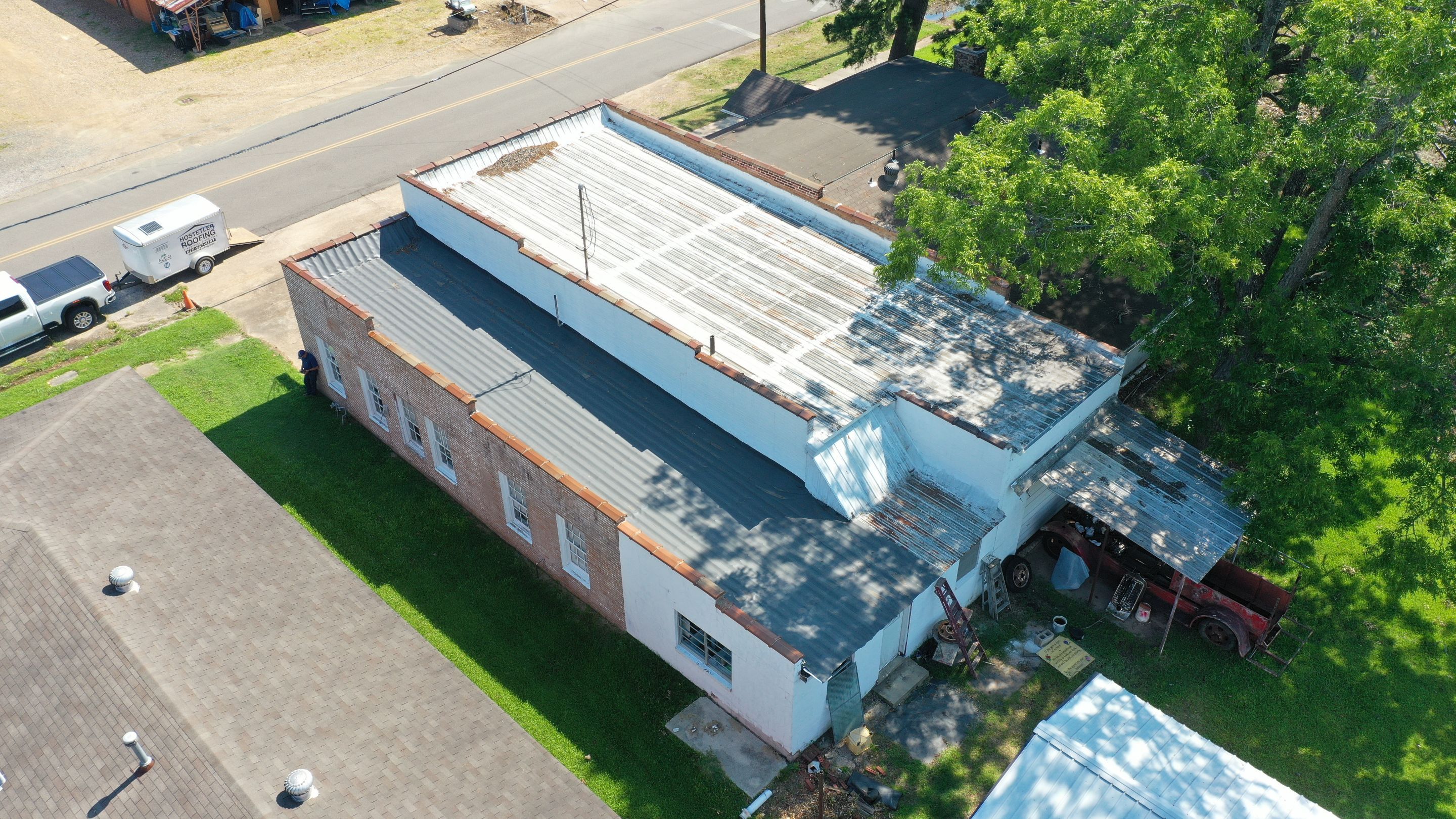 Commercial Roofing Installation using Aldocoat Coatings by Hostetler Roofing