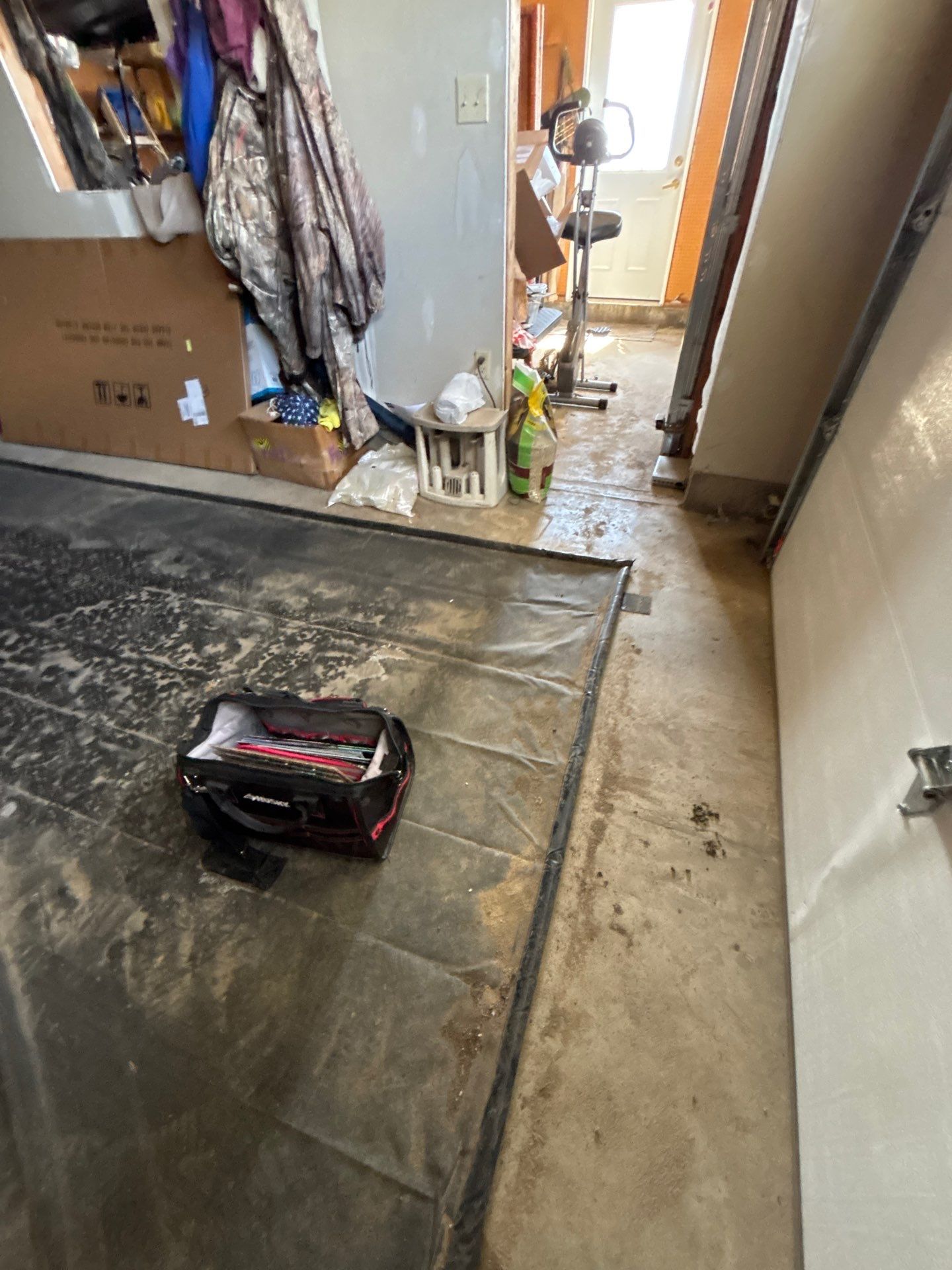 Speckled Epoxy Floor Coating Installation for Centerville Residential Garage by Select Painting, Coatings & Garage Cabinets