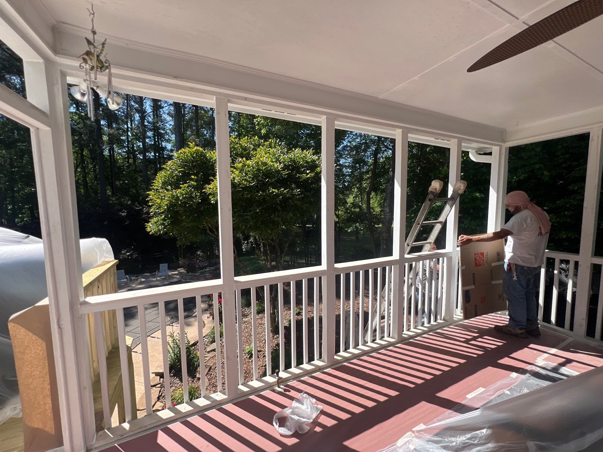 Multi-Level Pressure-Treated Wood Deck and Screened Porch in Acworth by Swift Home Renovations