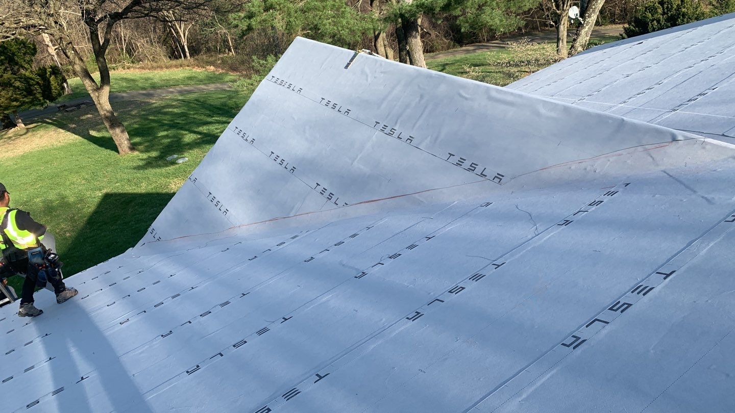 Tesla Solar Roof Replacement by American Home Contractors