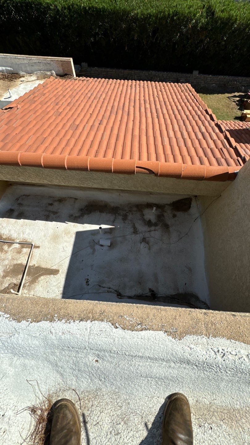 Re-coat & Tile Job by All Storm Roofing & Construction