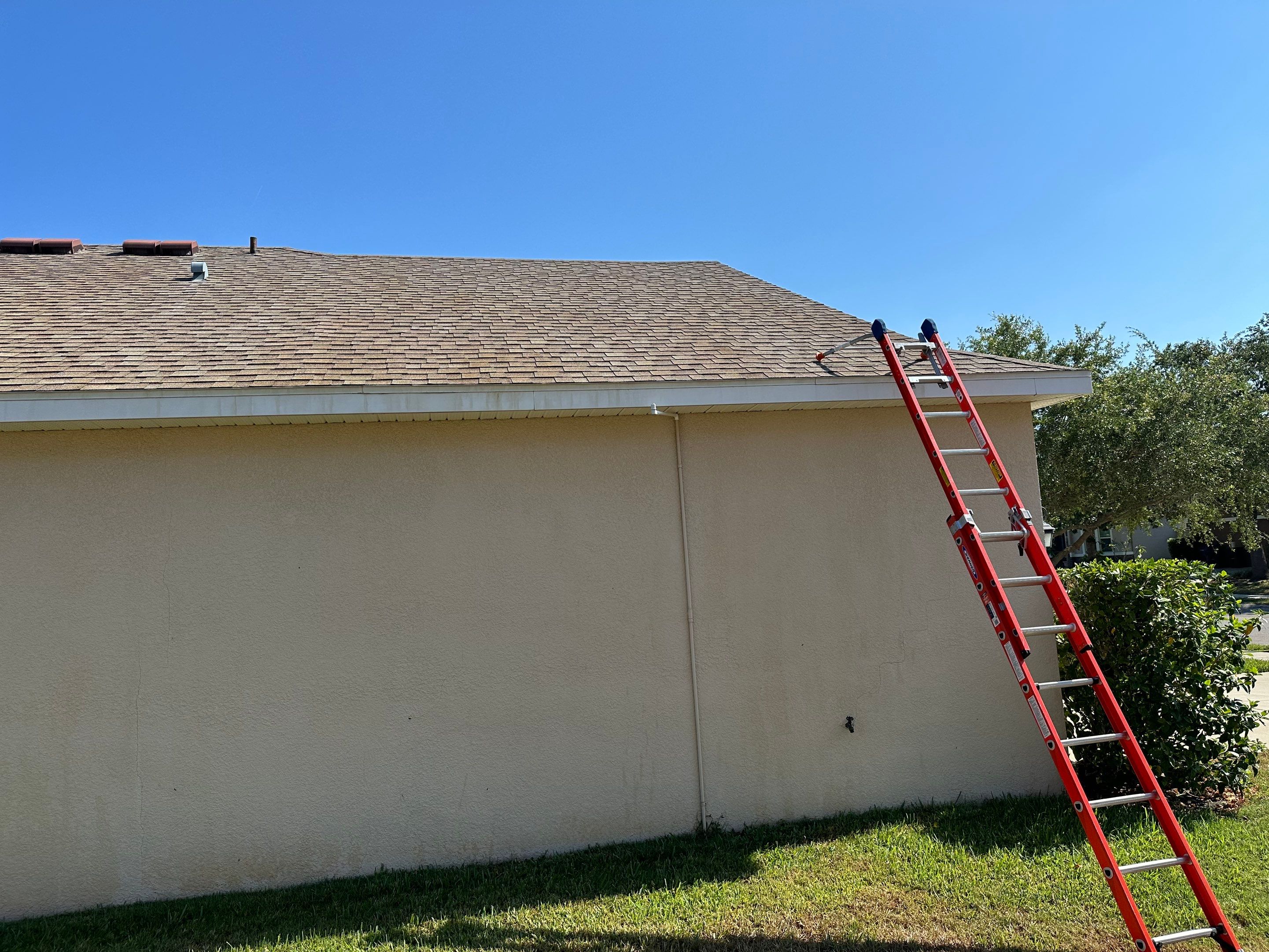 Asphalt Shingle Roof Soft Wash Cleaning & Concrete Pressure Washing in CopperStone Community, Parrish, FL by Sunshine AquaWash