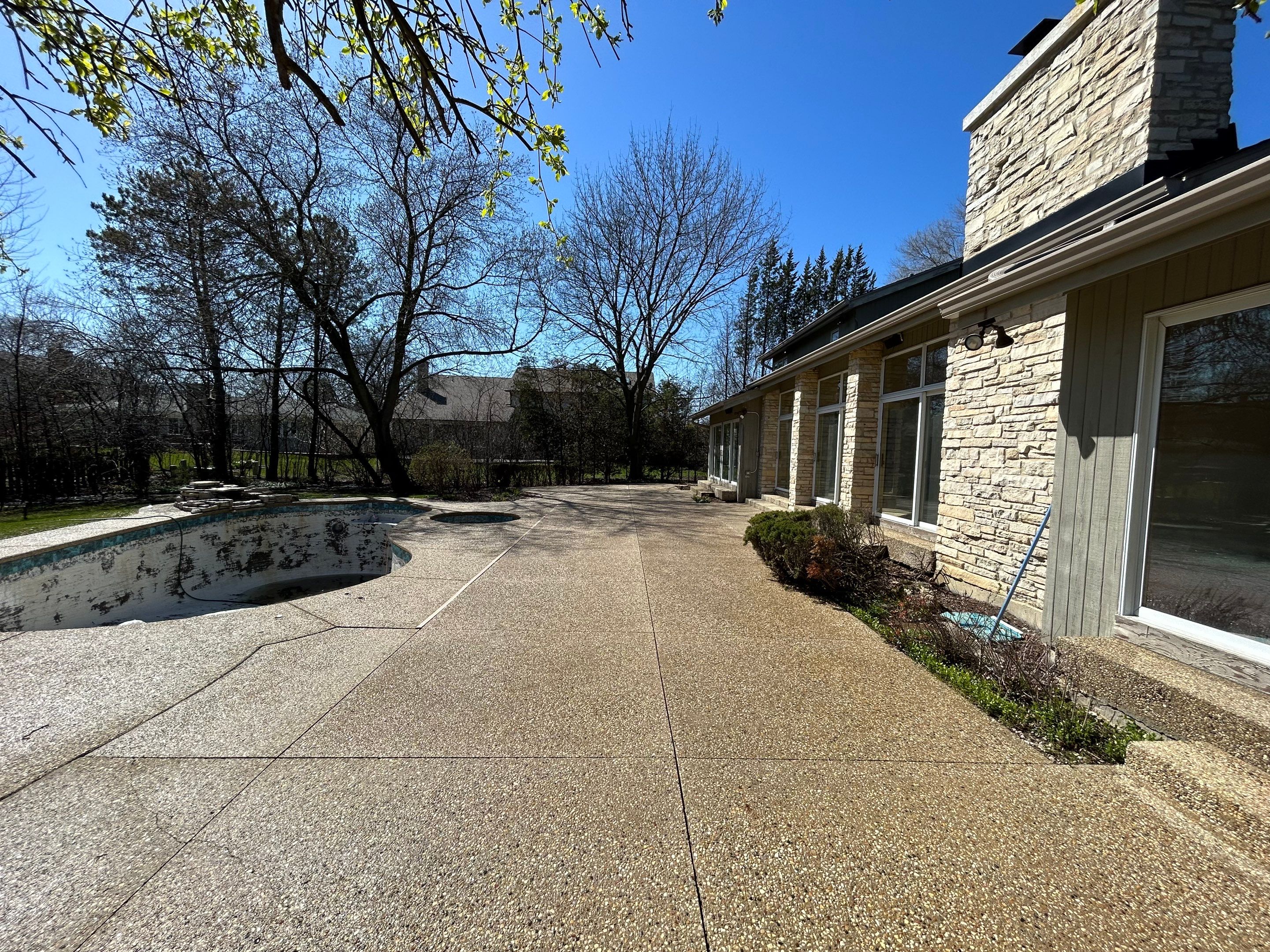 Aggregate Clean and seal using low gloss sealer by Northern Power Washing LLC.