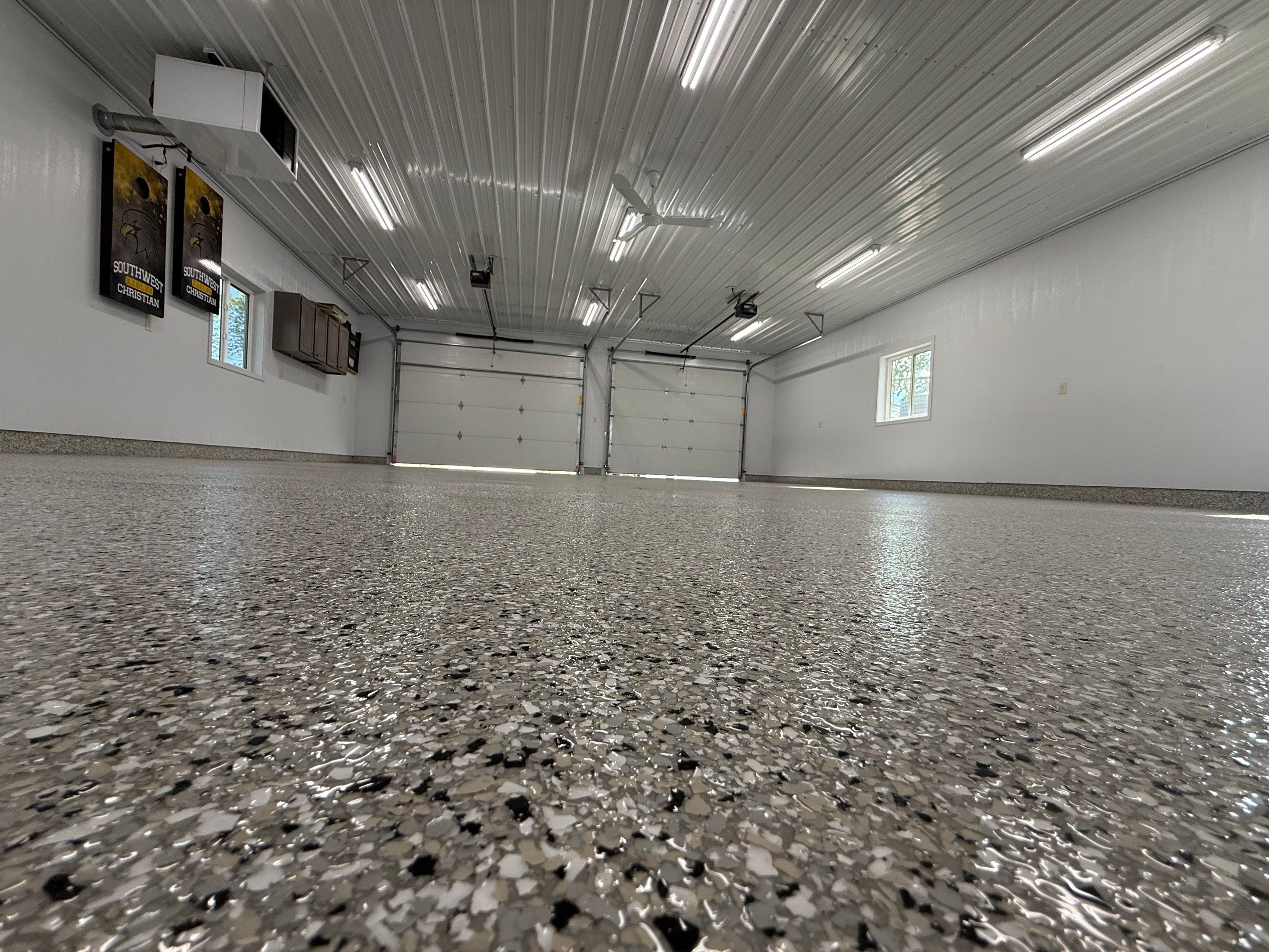 Speckled Epoxy Concrete Coating for Edgerton Garage Floor by Select Painting, Coatings & Garage Cabinets