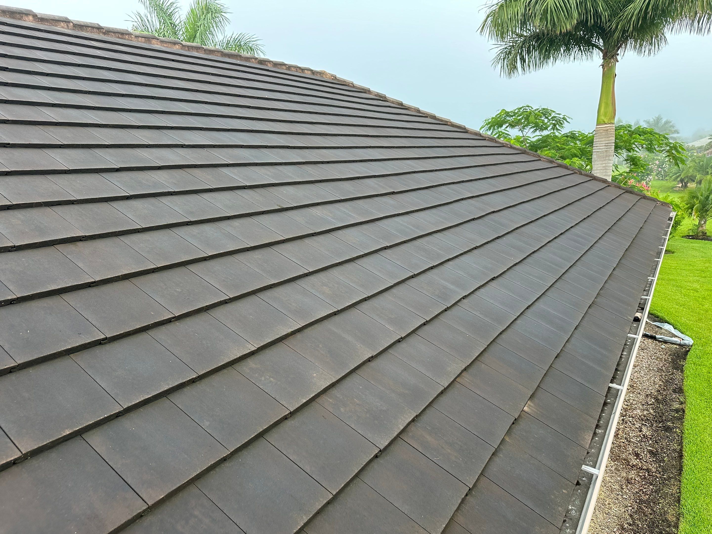 Flat Tile Roof Cleaning, House Wash & Sidewalk Cleaning in Enclave at Country Meadows, Bradenton, FL | Sunshine AquaWash by Sunshine AquaWash