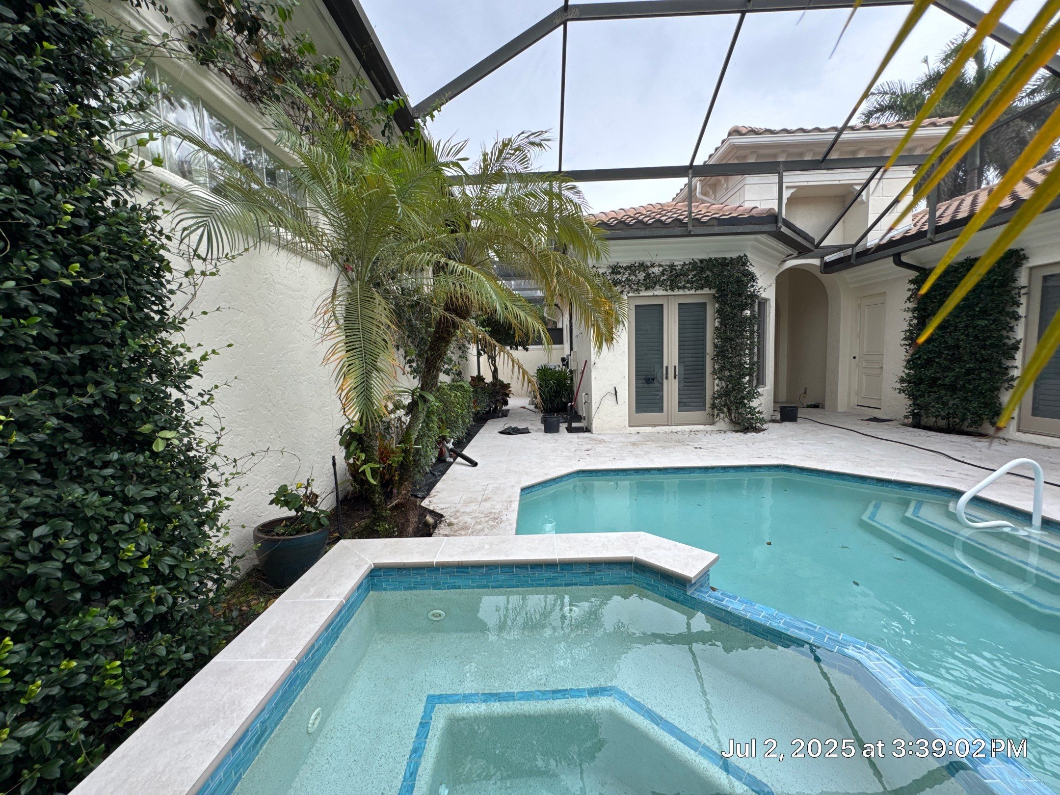 Pool Deck/Landscape/landscape lighting/pool coping/porcelain pavers/Pelican Marsh by Old Town Pavers Llc