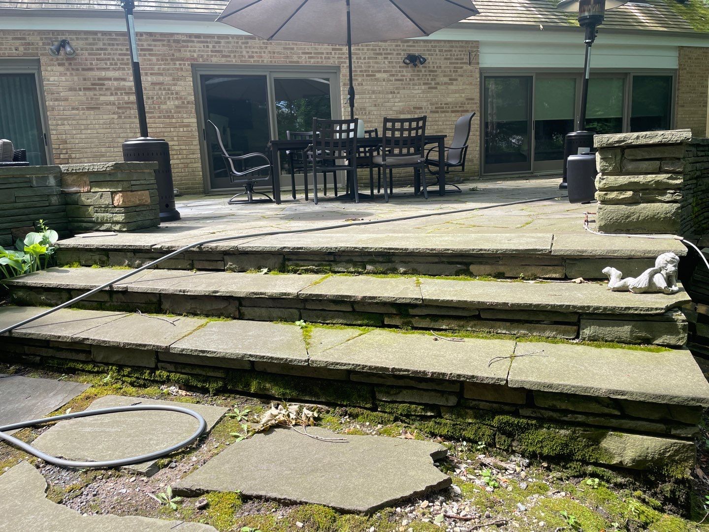 Bluestone patio cleaning by Northern Power Washing LLC.