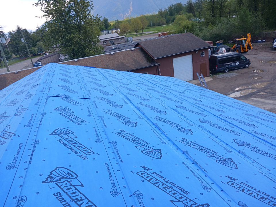 Commercial Roofing Installation using 12" Prolok metal  by Top Notch Roofing Inc