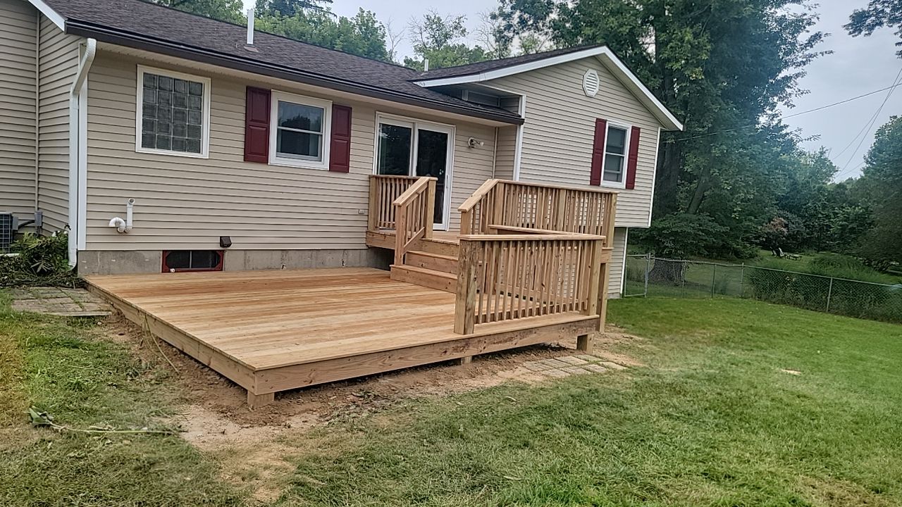 Deck Installation using Treated Lumber by Avalon Roofing and Exteriors