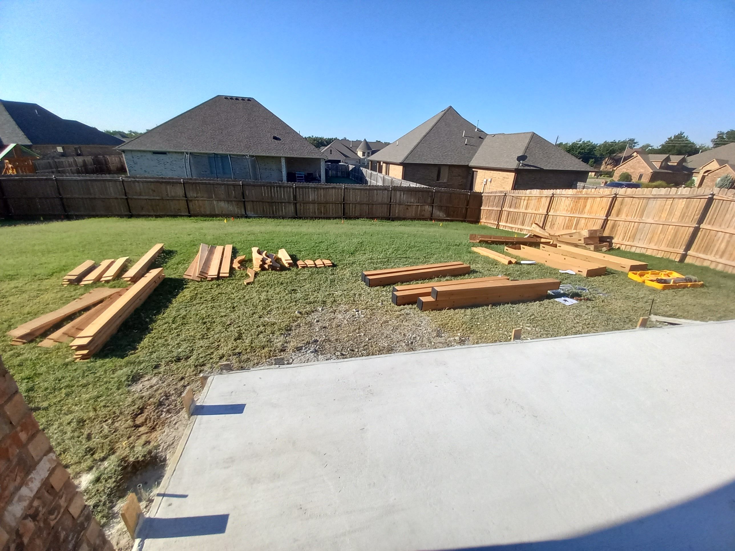 Concrete slab with Pergola by Clays Services Inc