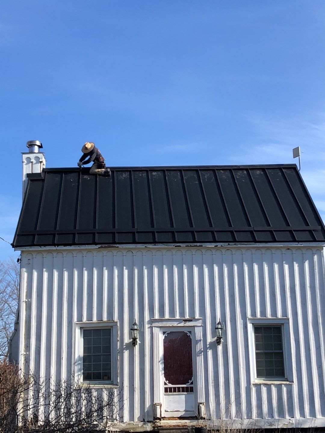 Residential Roofing Installation using 16" Standing Seam Panels by Jay Carter Roofing & Sheet Metal