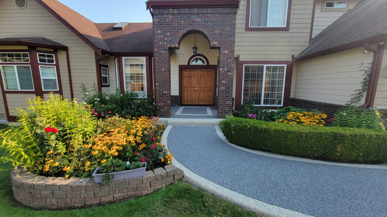 Elegant Walkway and Patio in Palazzo and Santorini Vuba Stone  by Concrete Coating Experts Inc.