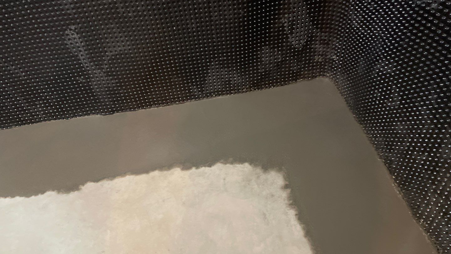 Interior Drain Tile & Buried Discharge in South Minneapolis by Waterproofing Northeast