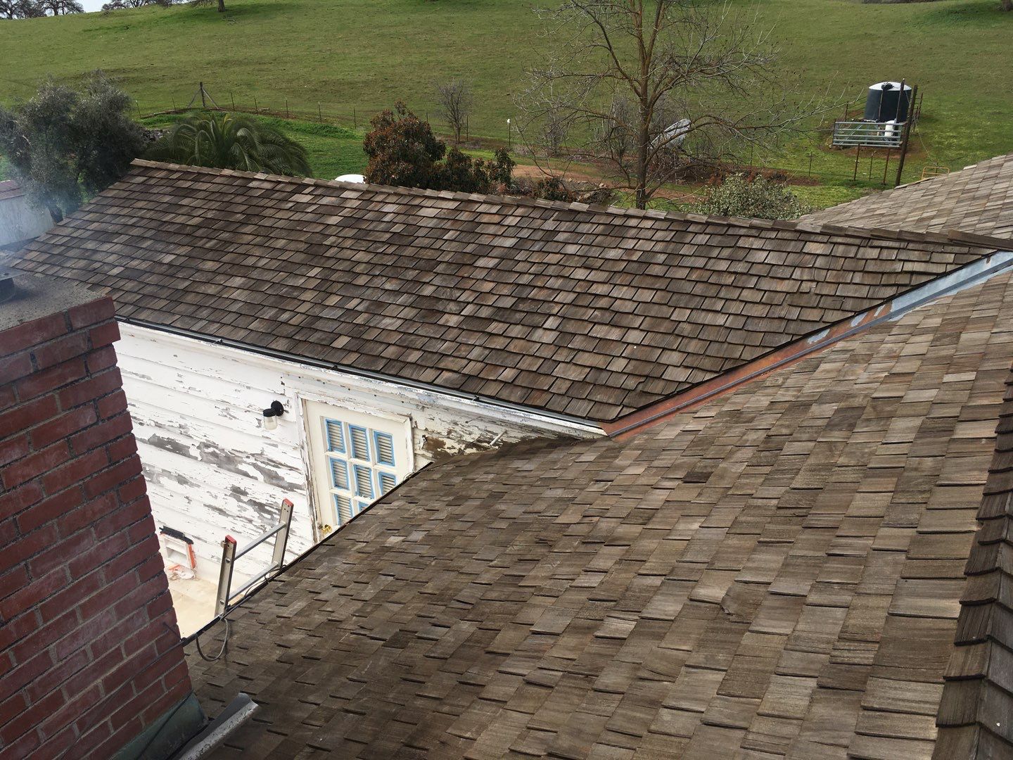 Residential Roofing Installation using Standing seam metal roofing system by Straight Edge Roofing Inc